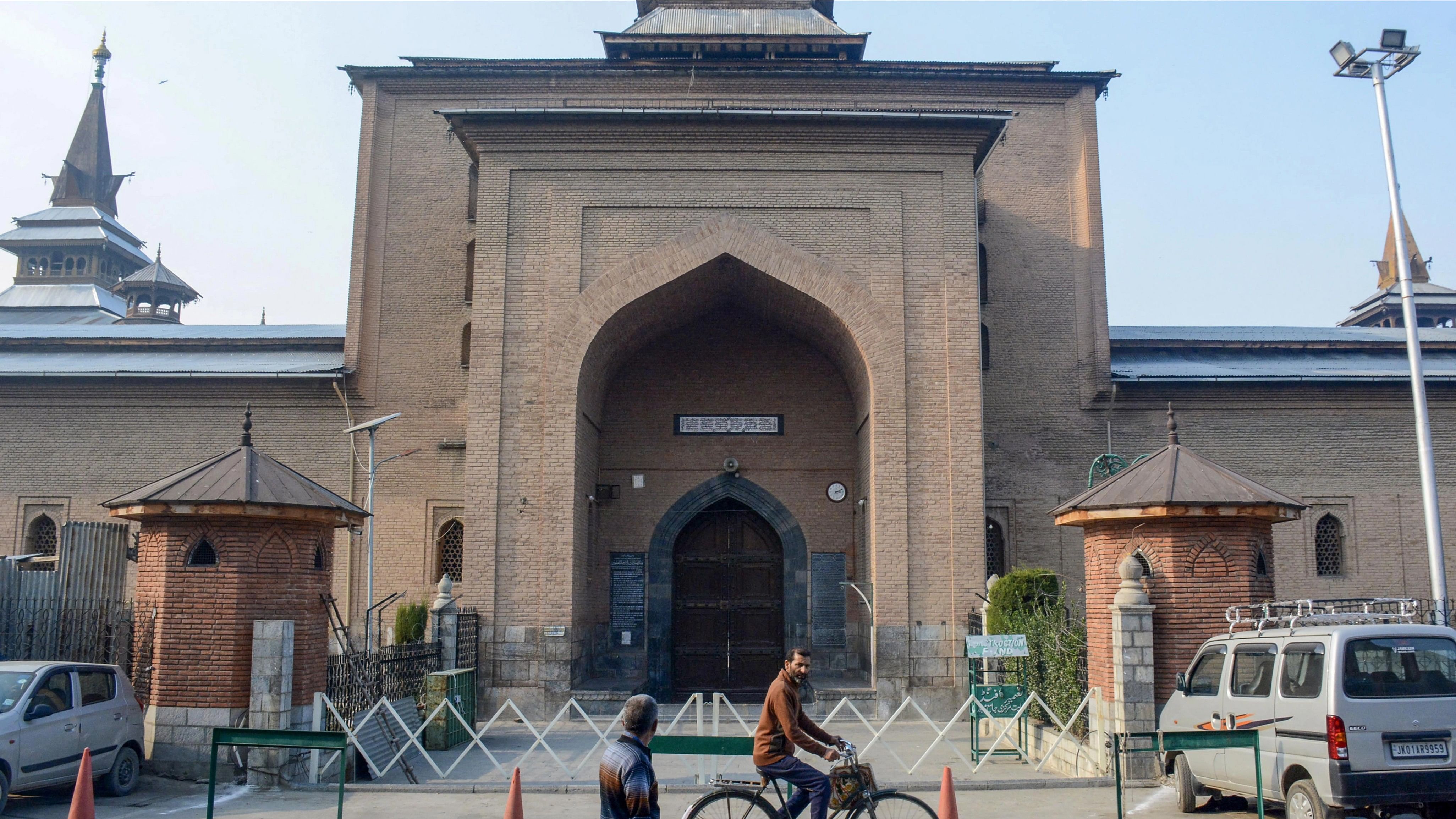 <div class="paragraphs"><p>Srinagar: A man rides his bicycle in front of the closed and deserted historic Jamia Masjid after authorities disallowed Friday prayers to maintain law and order following Israeli's bombardment on Gaza, in Srinagar.</p></div>