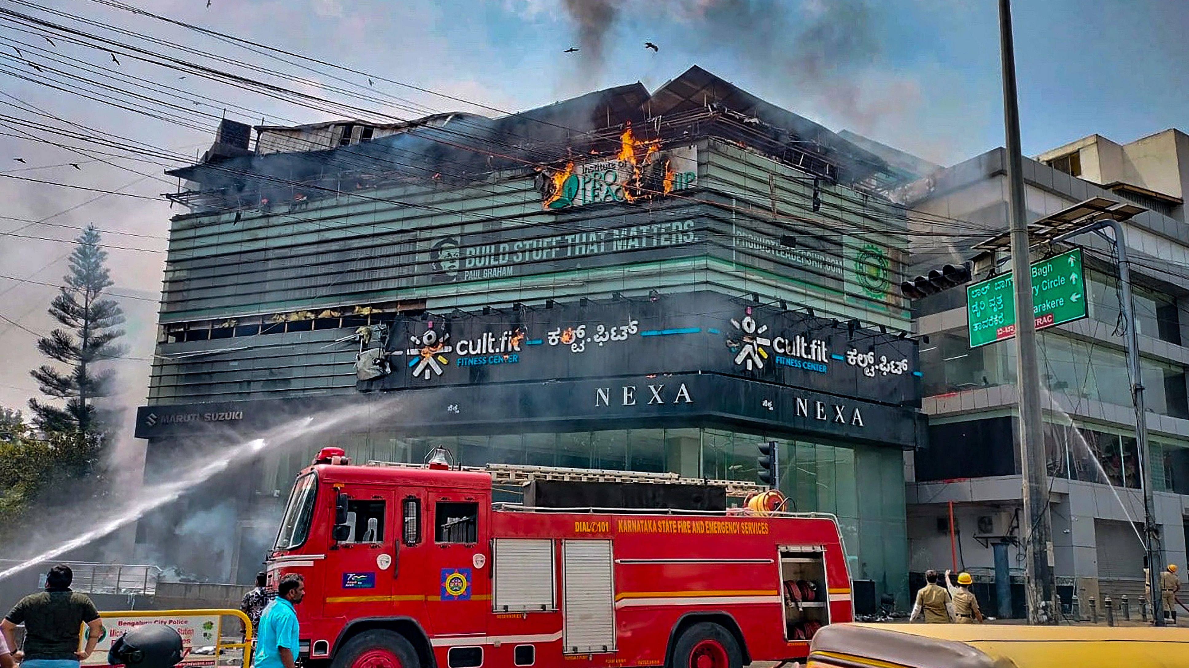 <div class="paragraphs"><p>Firefighters attempt to extinguish a fire that broke out at a multi-storey commercial building, in Bengaluru.&nbsp;</p></div>