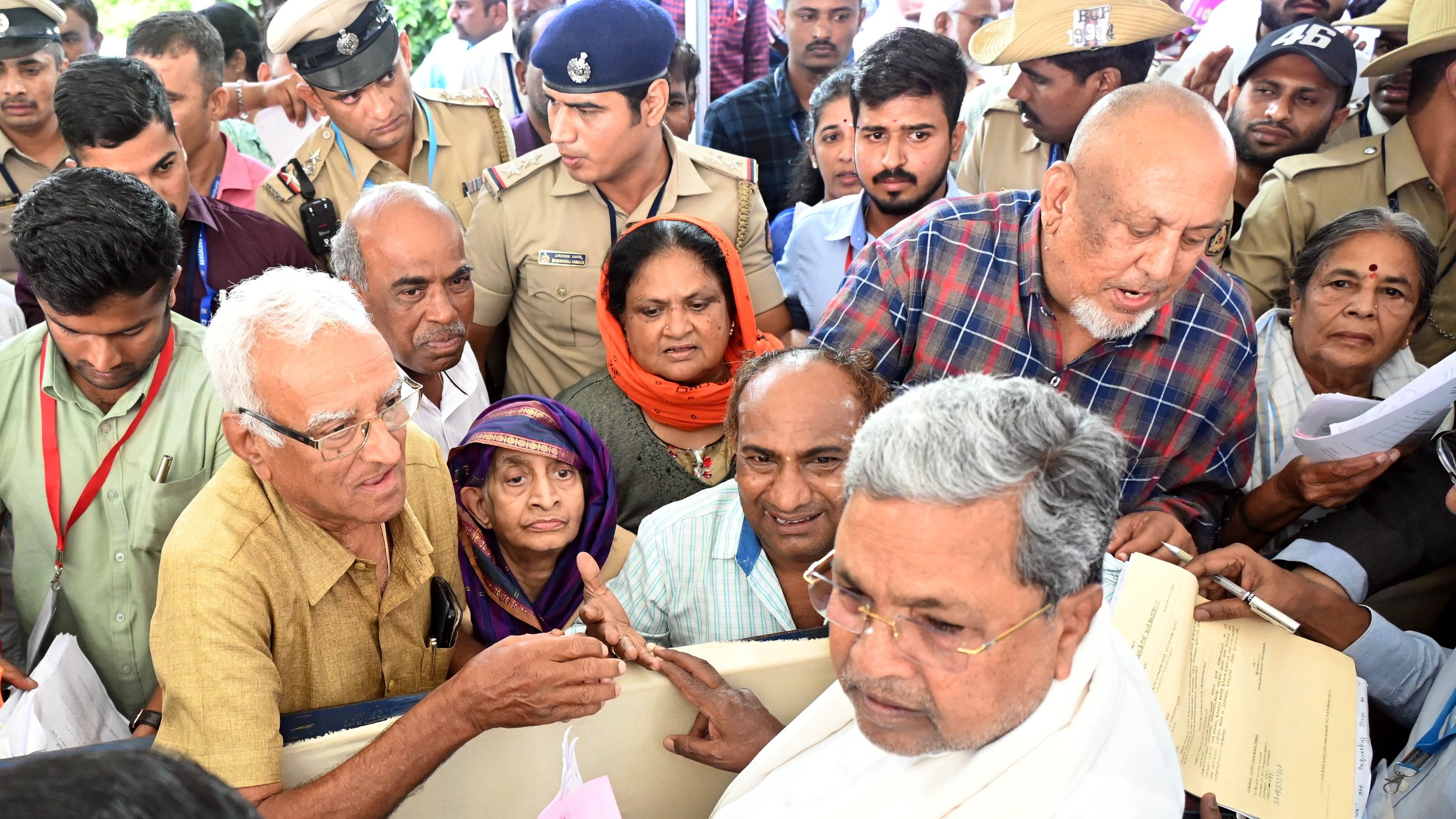 <div class="paragraphs"><p>Chief Minister Siddaramaiah interacts with citizens&nbsp;during ‘Jana Spandana,’&nbsp;at his home office ‘Krishna’ in Bengaluru on Monday. </p></div>