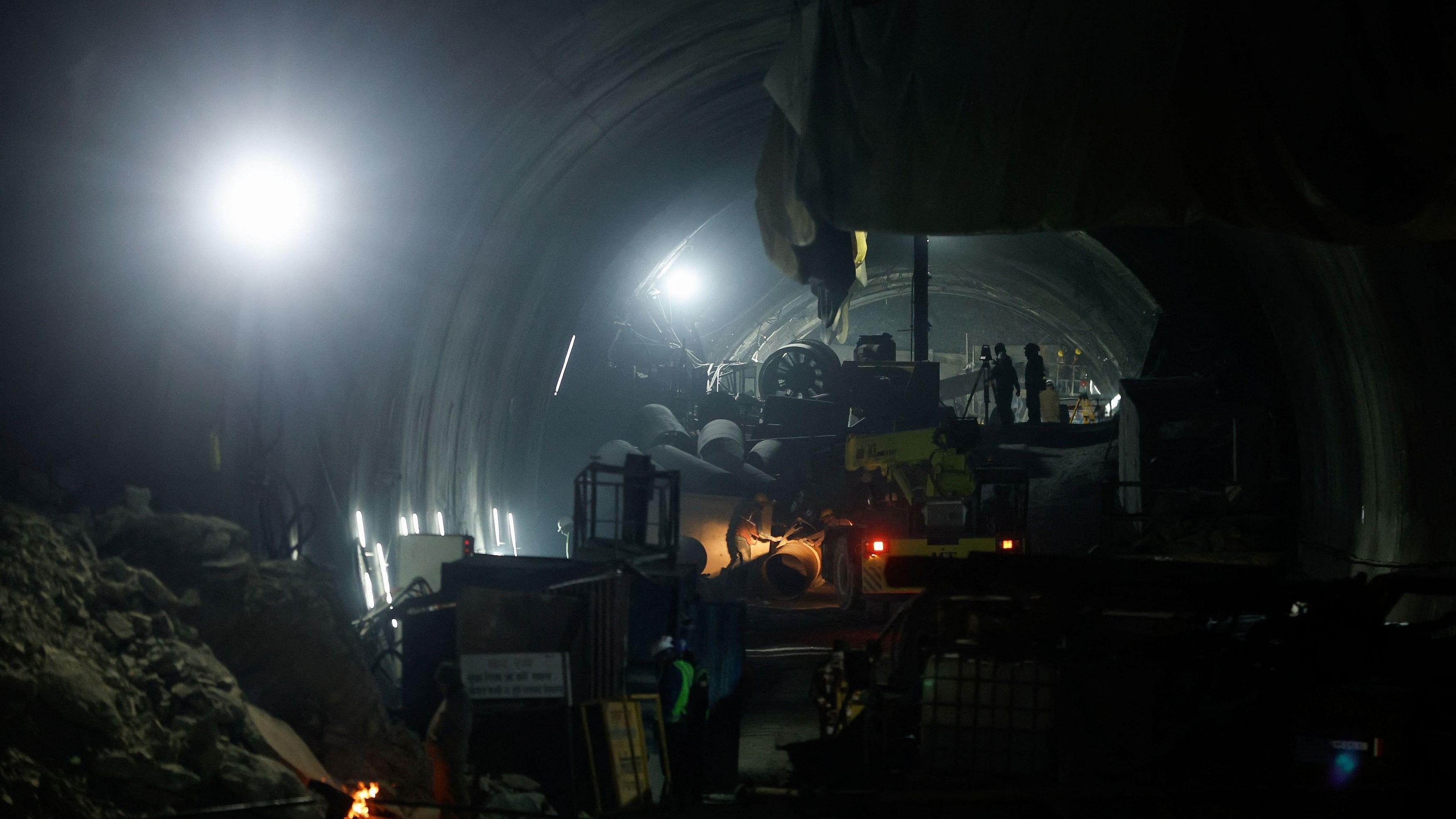 <div class="paragraphs"><p>Rescuers operate after workers got trapped in a collapse of an under-construction tunnel, in Uttarkashi, in the northern state of Uttarakhand.</p></div>