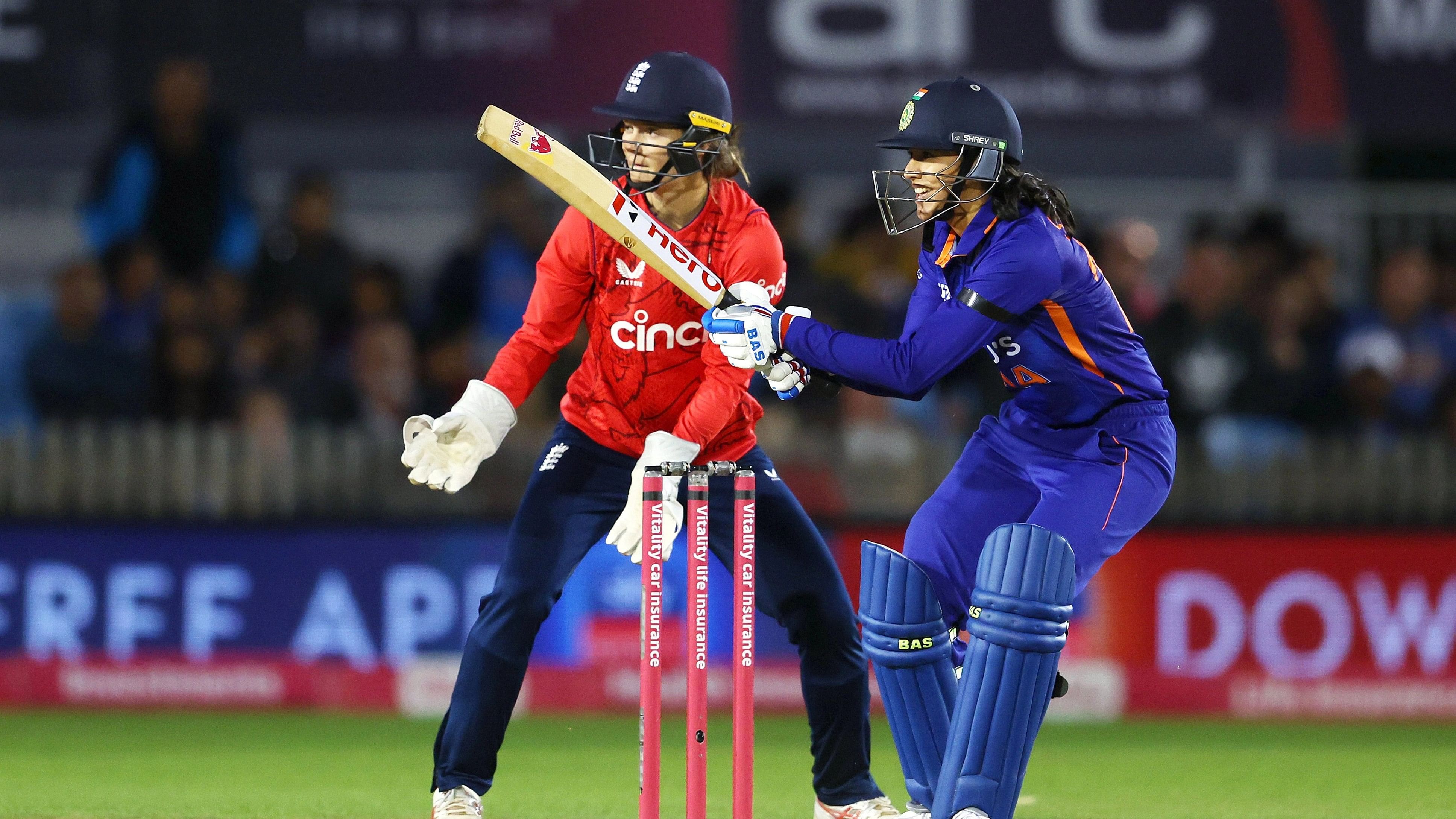 <div class="paragraphs"><p>Smriti Mandhana plays a shot during a T20 women's cricket match between India and England,&nbsp;Sept. 13, 2022.</p></div>