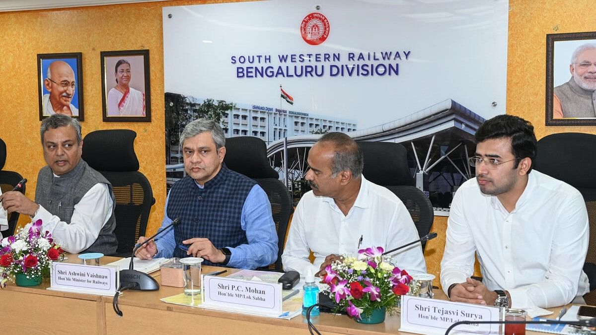 <div class="paragraphs"><p>Ashwini Vaishnaw, Union Minister of Railways, chairs the review meeting at South Western Railway Bengaluru Division at Divisional Railway Manager office in Bengaluru on Monday, November 27, 2023. Sanjeev Kishore, General Manager SWR; P C Mohan; and MP Tejasvi Surya were present at the meeting.</p></div>