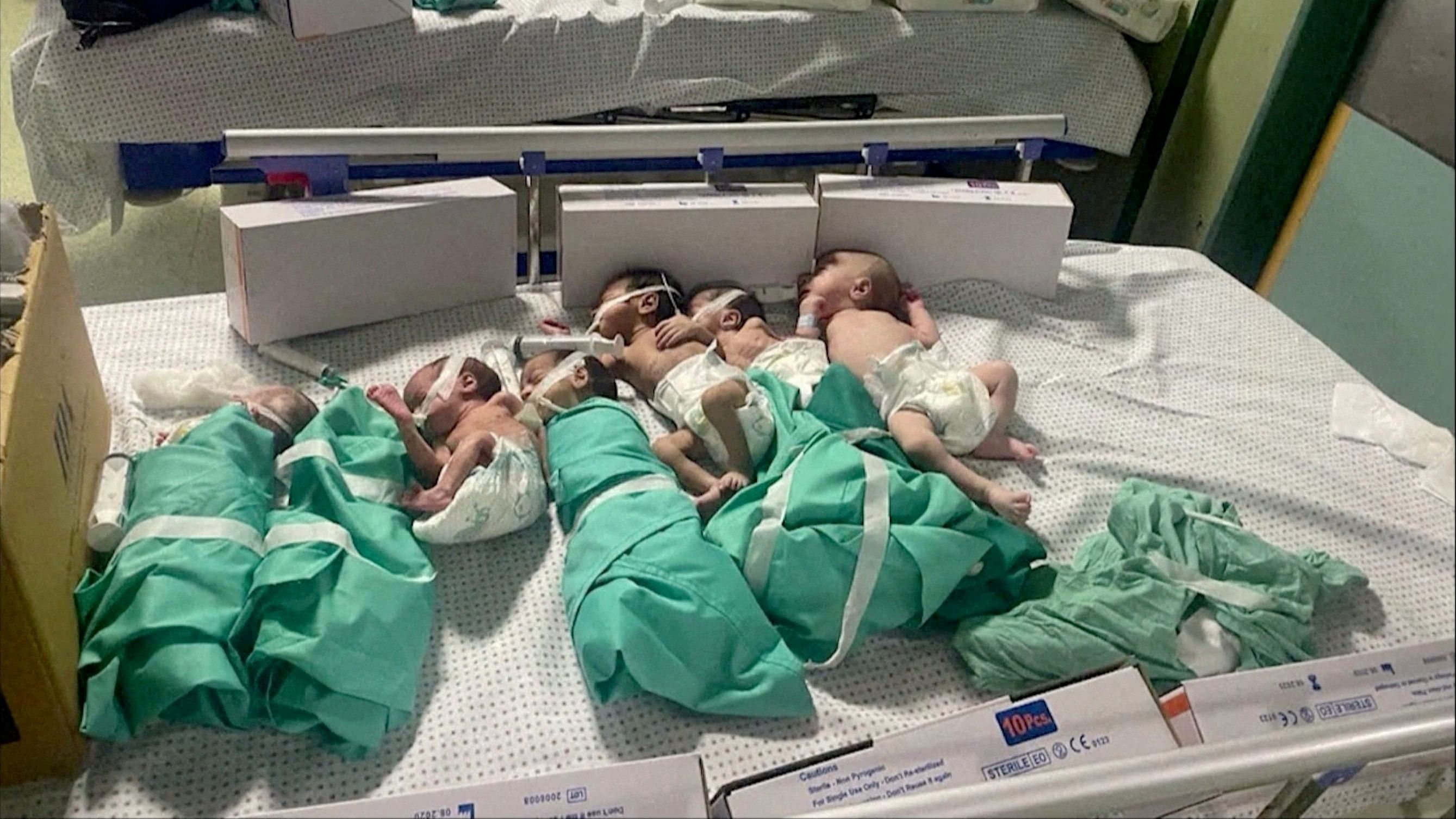 <div class="paragraphs"><p>File Photo: Newborns are placed in bed after being taken off incubators in Gaza's Al Shifa hospital after a power outage, amid the ongoing war between Israel and the Palestinian Islamist group Hamas, in Gaza City, Gaza November 12, 2023.</p></div>