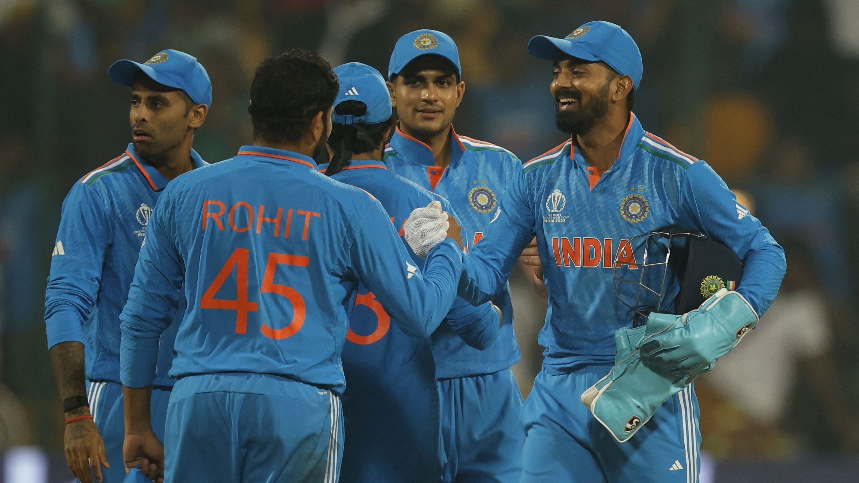 <div class="paragraphs"><p>India v Netherlands at the M. Chinnaswamy Stadium, Bengaluru, India, November 12, 2023.&nbsp; India's KL Rahul celebrates with Rohit Sharma and teammates after the match.</p></div>
