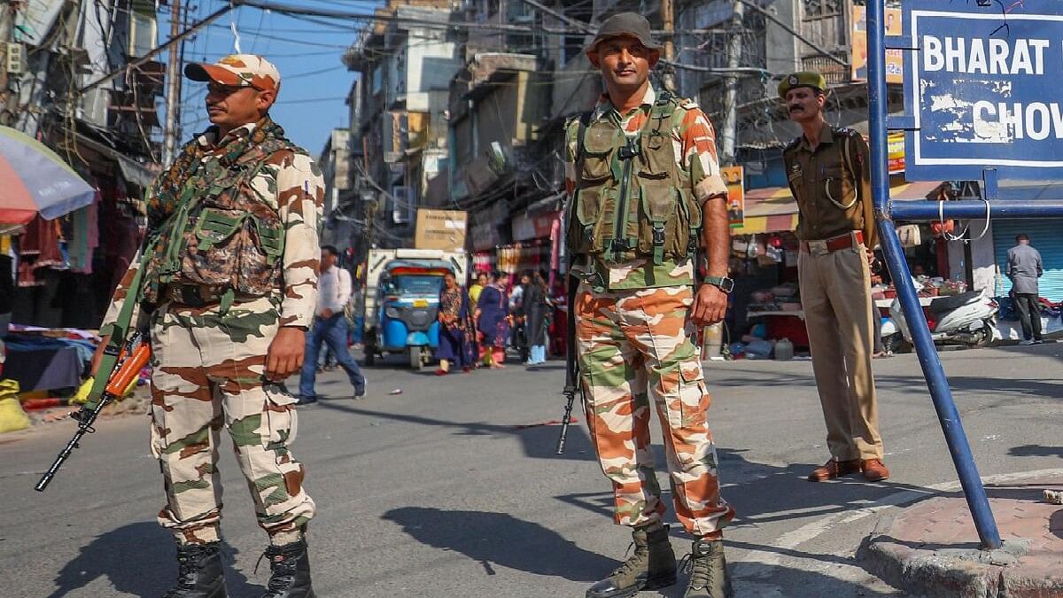 <div class="paragraphs"><p>Security personnel stand guard at a market in Jammu Kashmir.&nbsp;</p></div>