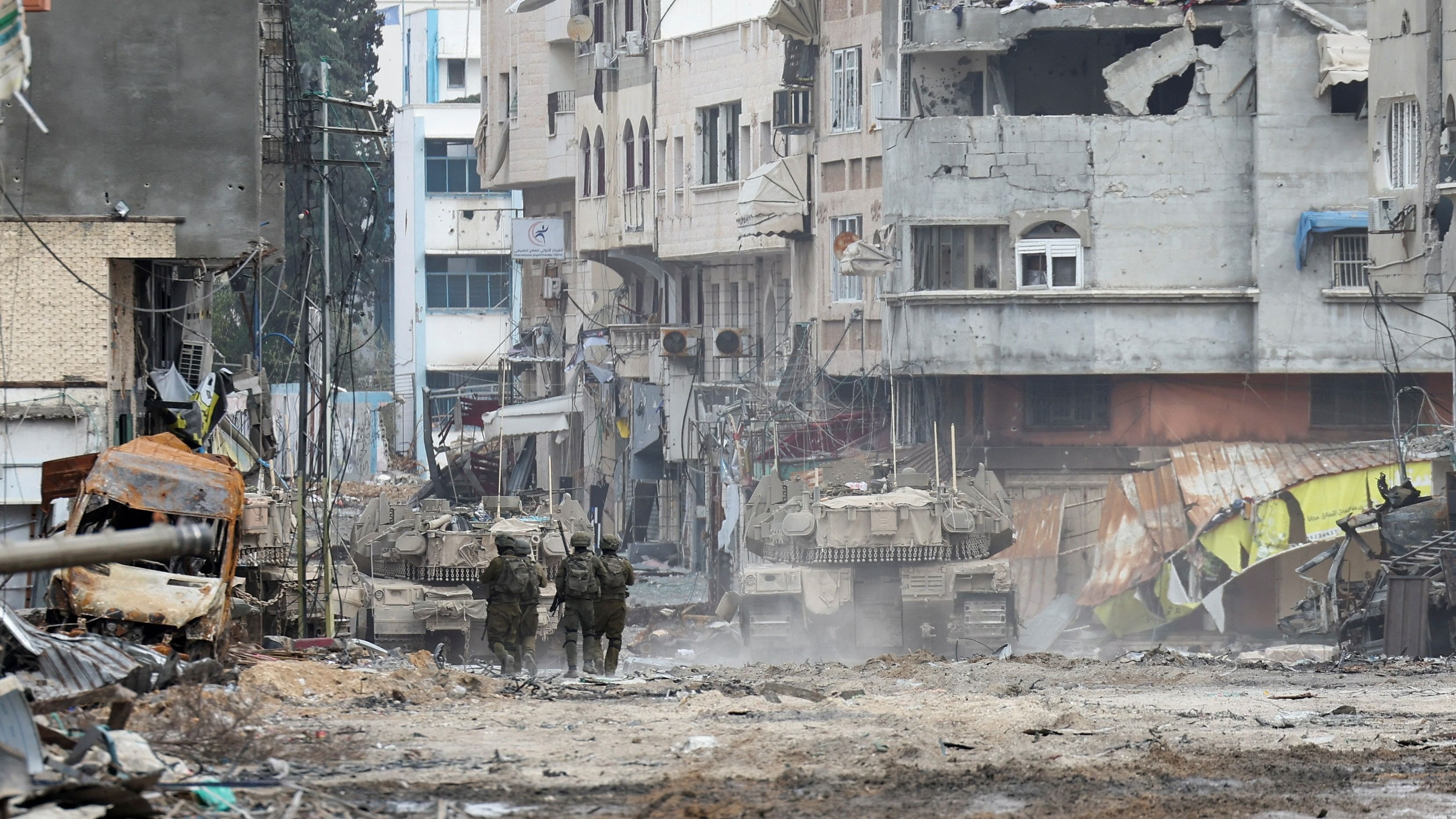 <div class="paragraphs"><p>Israeli soldiers and tanks operate, amid the ongoing ground operation of the Israeli army against Palestinian Islamist group Hamas, in the northern Gaza Strip, November 22, 2023. </p></div>