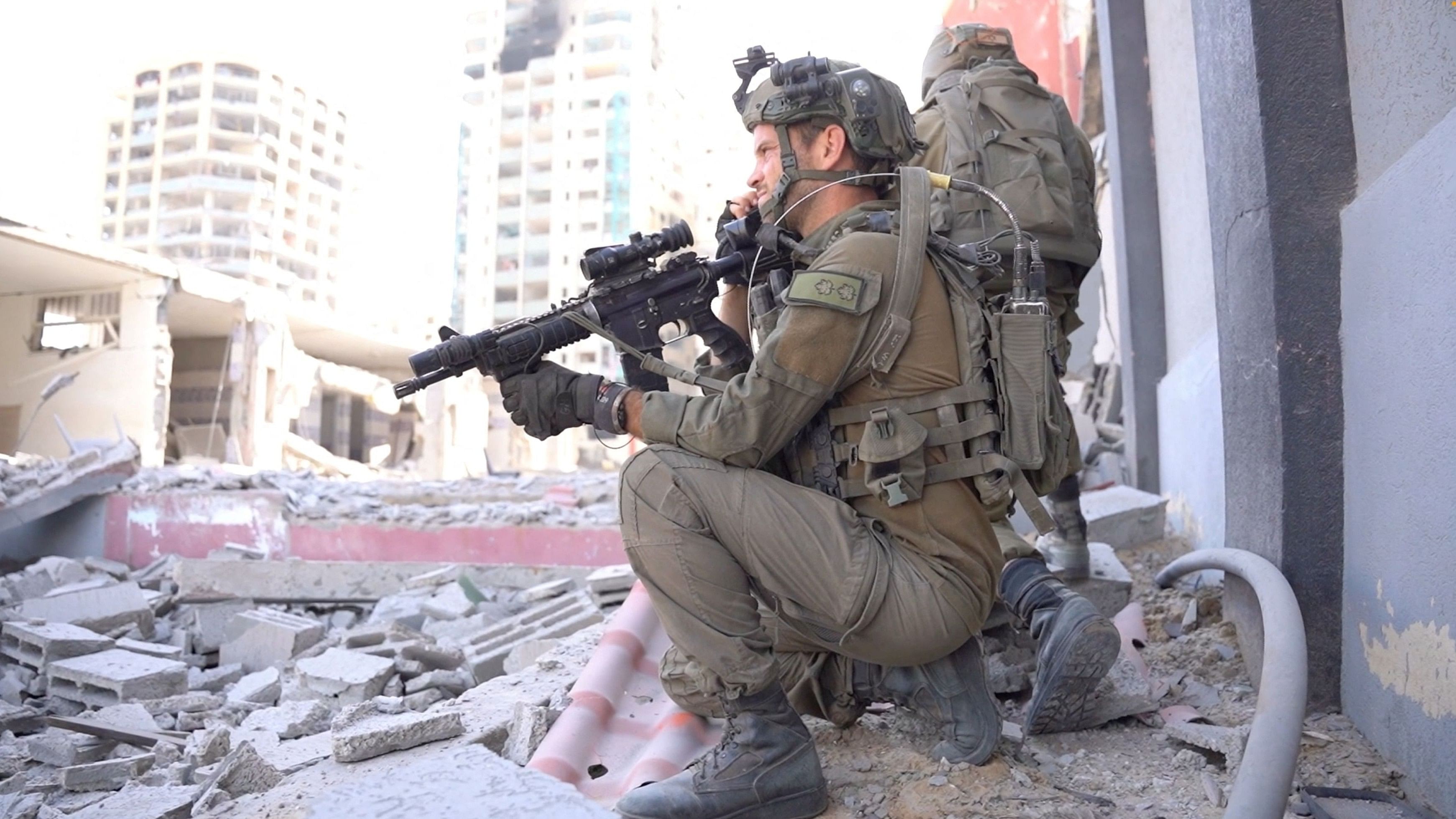 <div class="paragraphs"><p>Israeli soldiers operate amid what the Israeli army says is the ongoing ground operation against the Palestinian Islamist group Hamas, in a location given as Gaza, in this screen grab from a handout video released on November 14, 2023.</p></div>