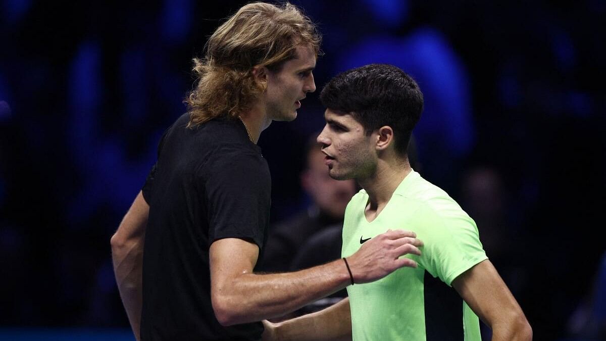 <div class="paragraphs"><p>Germany's Alexander Zverev with Spain's Carlos Alcaraz after winning their group stage match.</p></div>