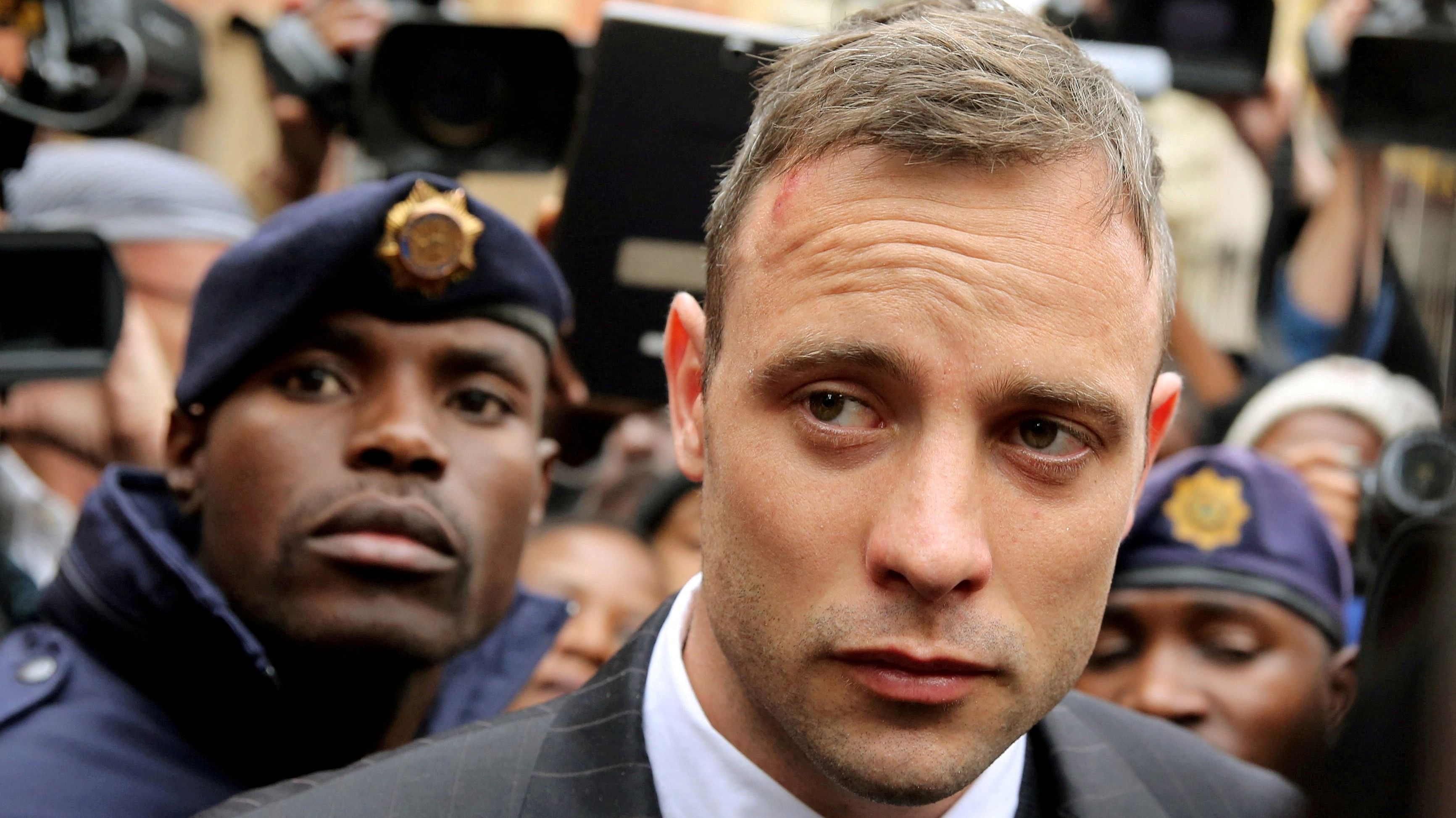 <div class="paragraphs"><p>FILE PHOTO: Olympic and Paralympic track star Oscar Pistorius leaves court after appearing for the 2013 killing of his girlfriend Reeva Steenkamp in the North Gauteng High Court in Pretoria, South Africa, June 14, 2016. </p></div>