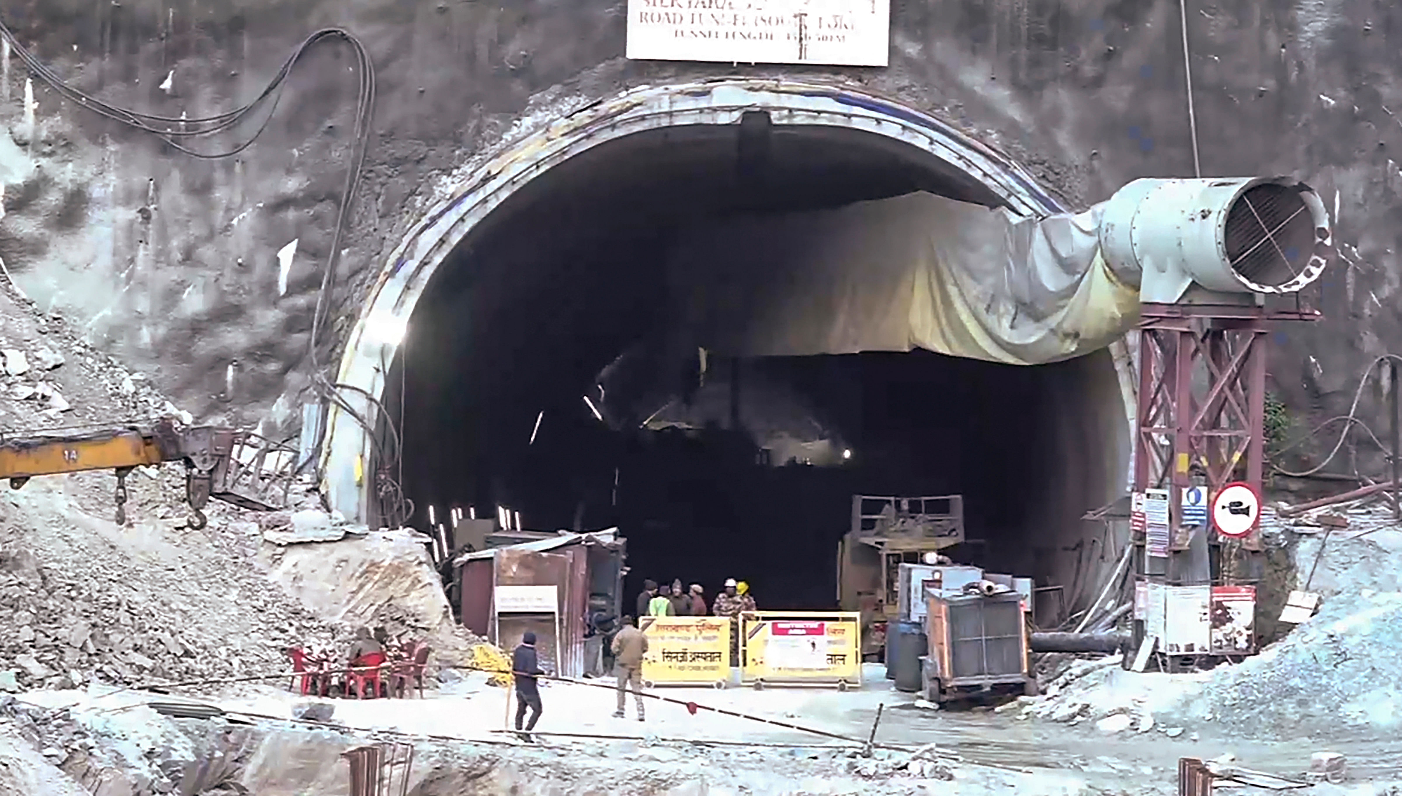 <div class="paragraphs"><p>Security personnel at the under-construction tunnel between Silkyara and Dandalgaon on the Brahmakhal-Yamunotri national highway, days after it collapsed trapping several workers inside, in Uttarkashi district, Thursday, Nov. 16, 2023. </p></div>