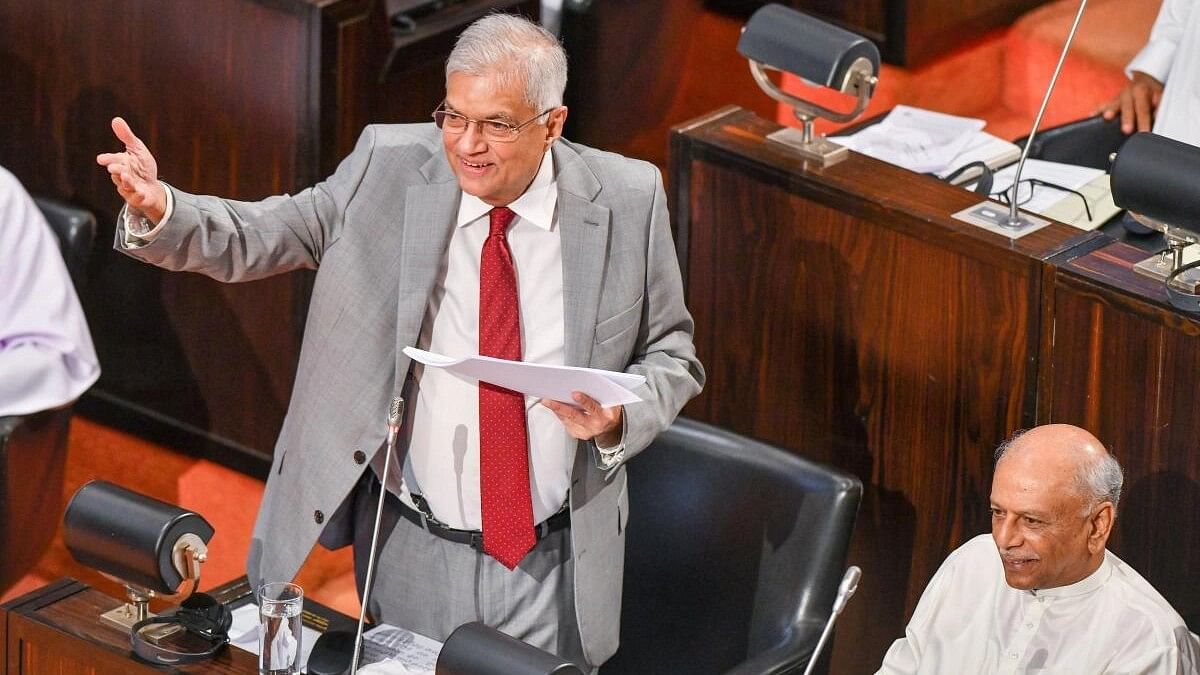 <div class="paragraphs"><p>Sri Lanka's president Ranil Wickremesinghe, who is also the island nation's finance minister, presents the 2024 budget at the parliament in Colombo, Sri Lanka November 13, 2023.</p></div>