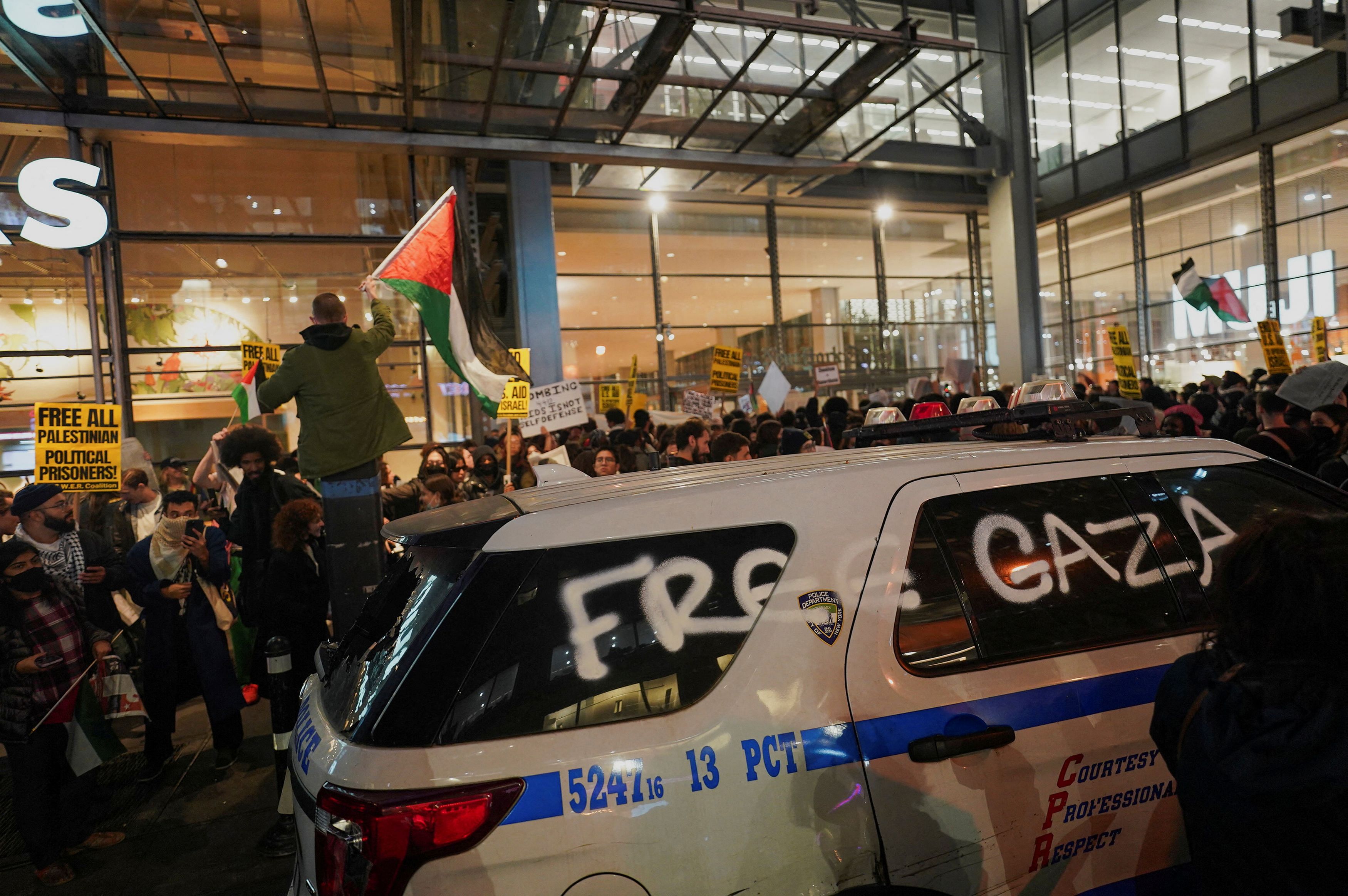 <div class="paragraphs"><p>People take part in a rally in support of Palestinians in Gaza, during the ongoing conflict between Israel and Hamas, outside the New York Times building, in New York City.</p></div>