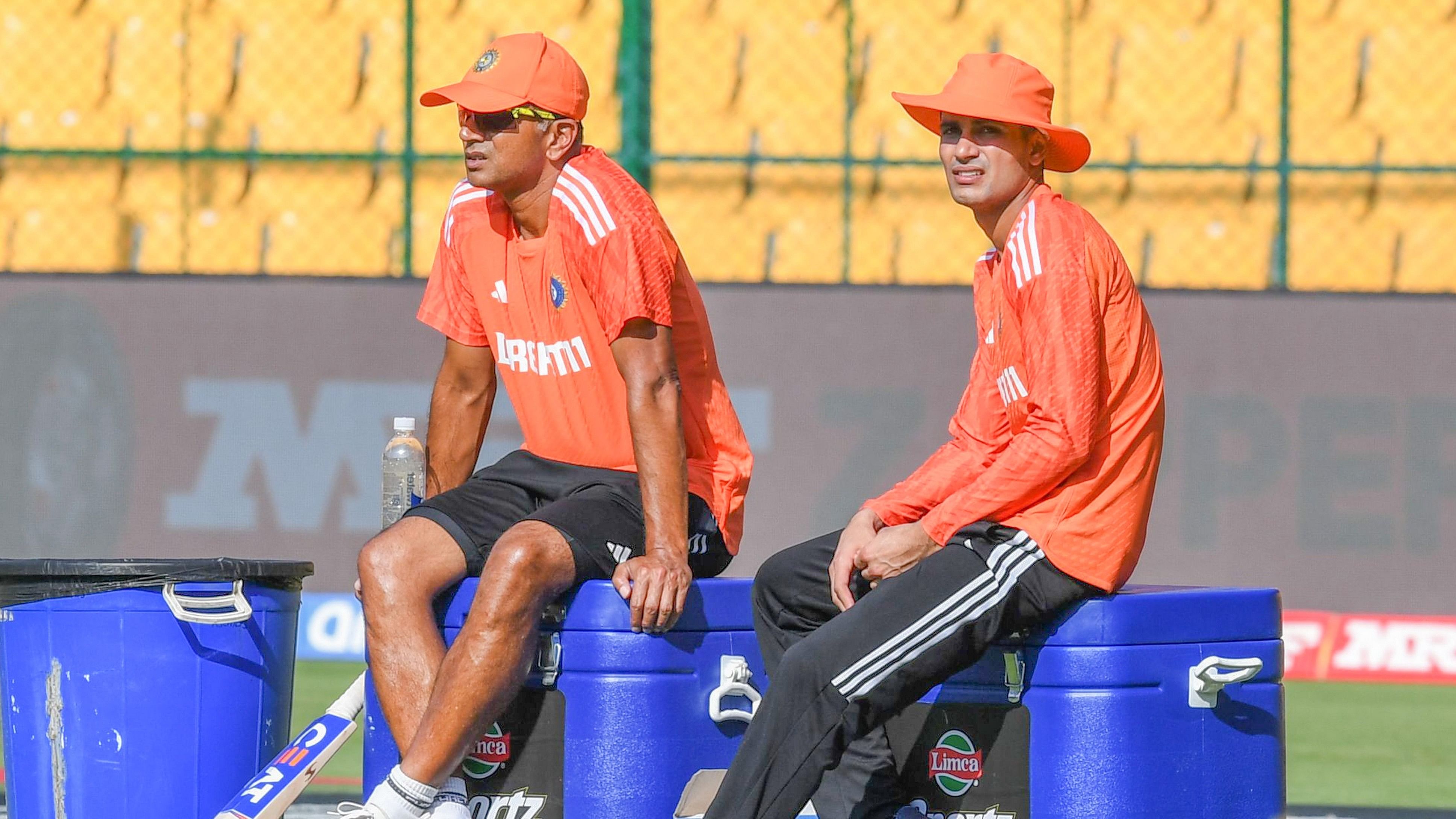 <div class="paragraphs"><p>Head coach Rahul Dravid Coach and opener Shubman Gill take a short break from practice proceedings at the M Chinnaswamy Stadium in Bengaluru on Saturday. </p></div>