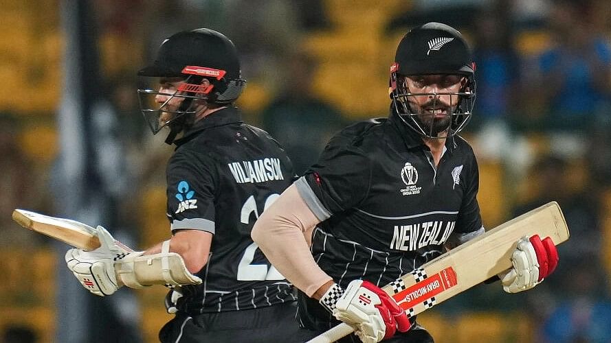 <div class="paragraphs"><p>New Zealand batters Daryl Mitchell and Kane Williamson run between the wickets during the ICC Men's Cricket World Cup match between New Zealand and Sri Lanka, at Chinnaswamy Stadium in Bengaluru, Thursday, Nov. 9, 2023.</p></div>