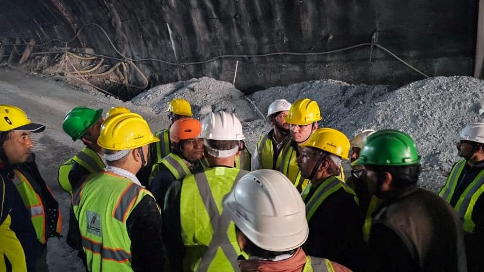 <div class="paragraphs"><p>Members of rescue teams are pictured during a rescue operation after a portion of an under-construction tunnel collapsed in Uttarkashi in the northern state of Uttarakhand, India, October 13, 2023.</p></div>