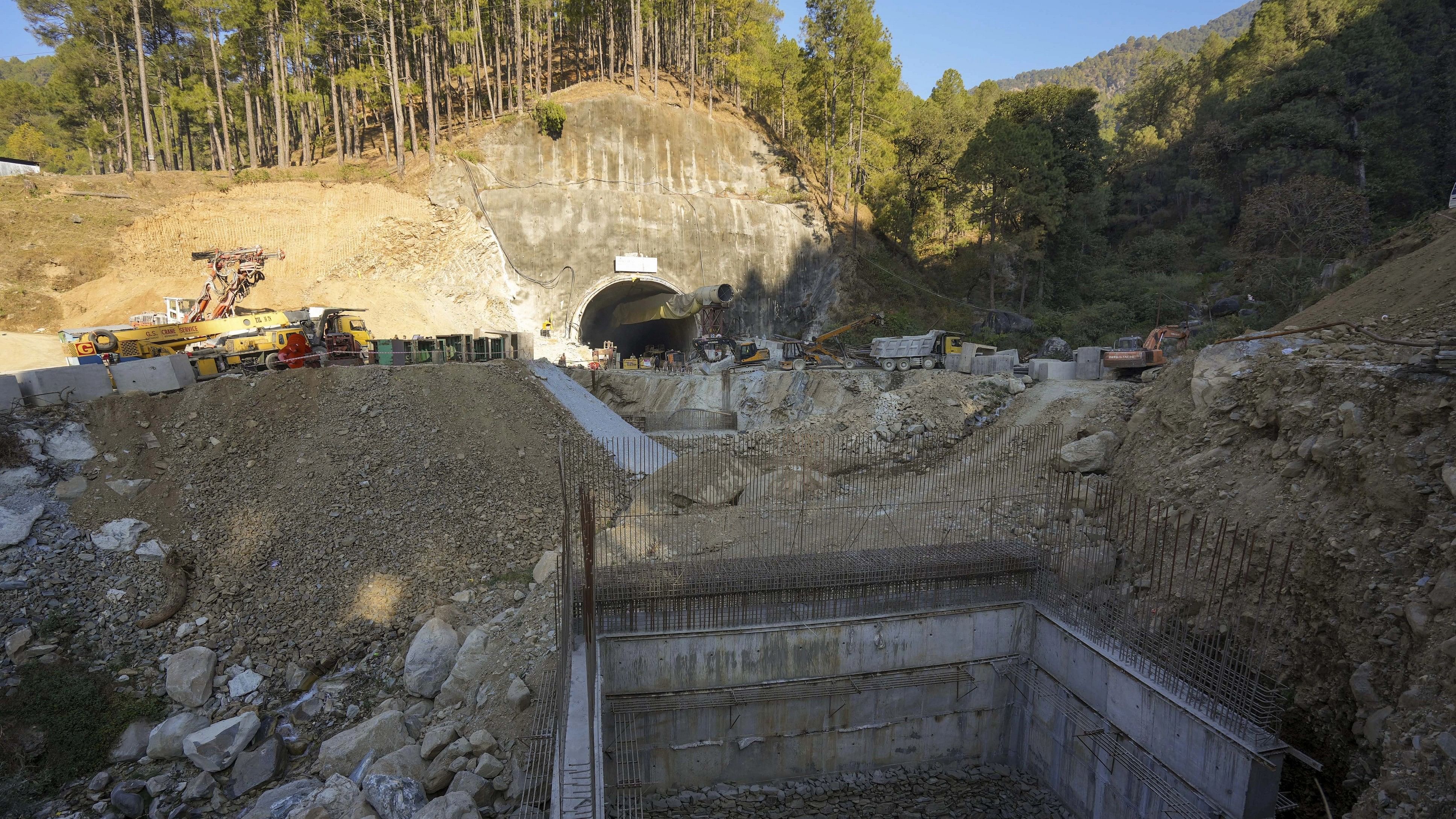 <div class="paragraphs"><p>Uttarkashi: Security personnel and others at the under-construction Silkyara tunnel as drilling through the rubble to prepare an escape route for the 41 trapped workers remains stalled, in Uttarkashi district, Friday morning, Nov. 24, 2023. </p></div>
