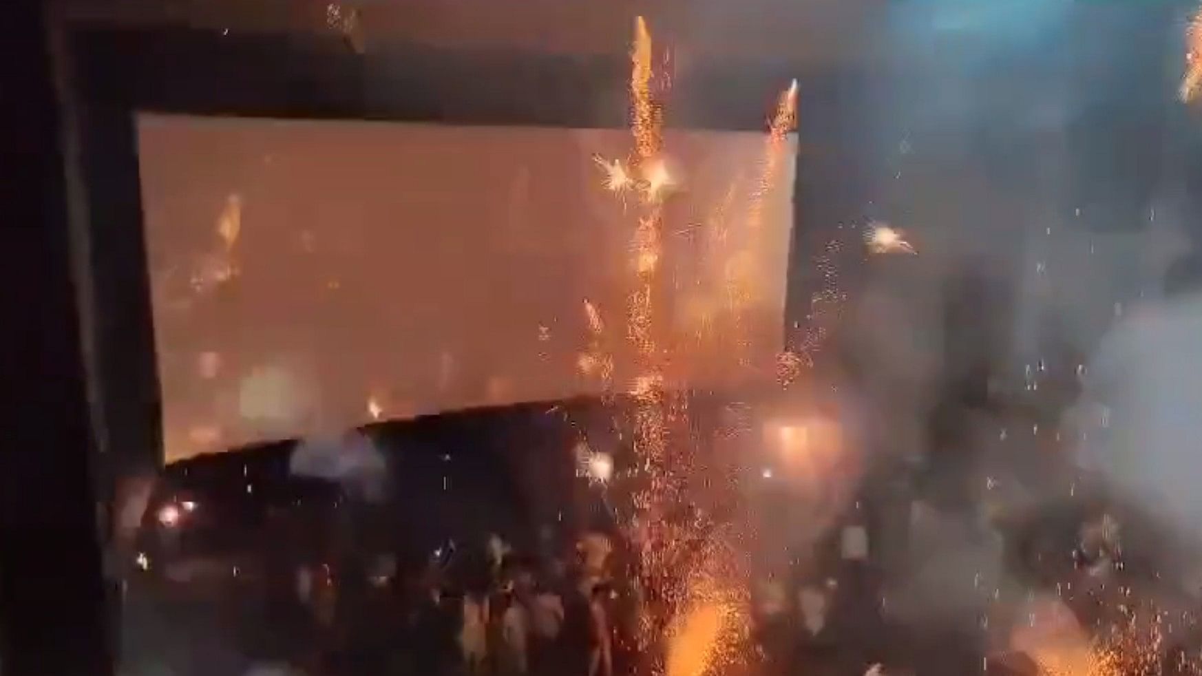 <div class="paragraphs"><p>Screengrab of video showing crackers burst inside the Malegaon hall during 'Tiger 3' screening.</p></div>