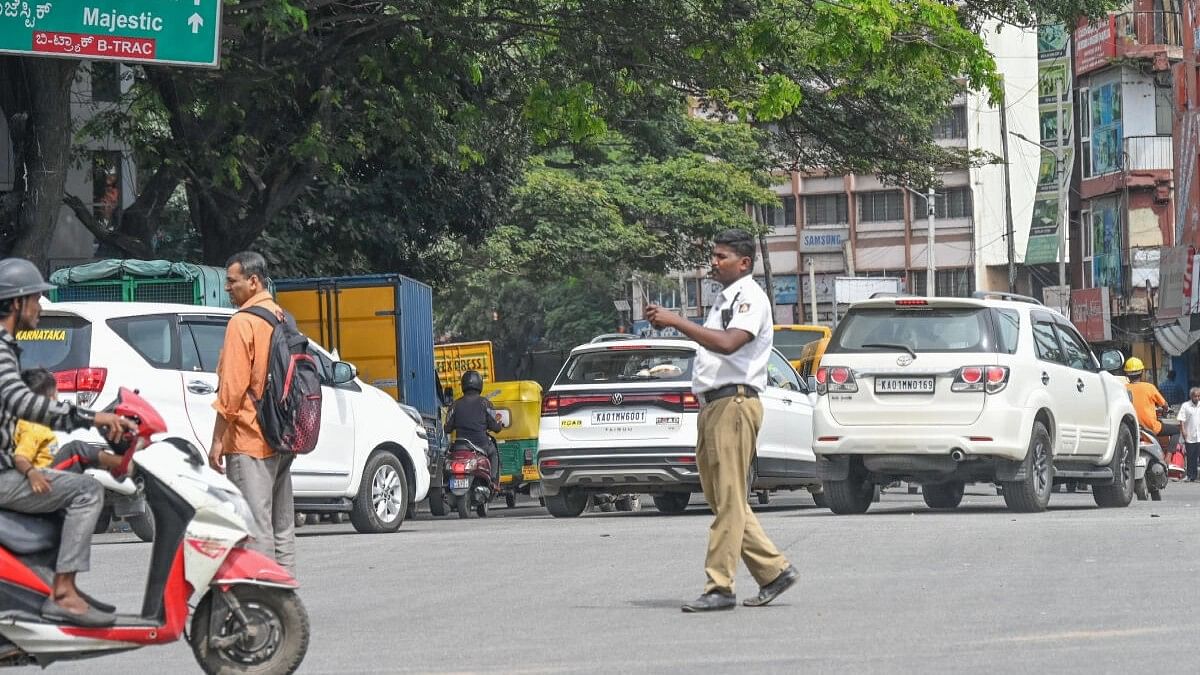 <div class="paragraphs"><p>A Bengaluru traffic police on duty.</p></div>