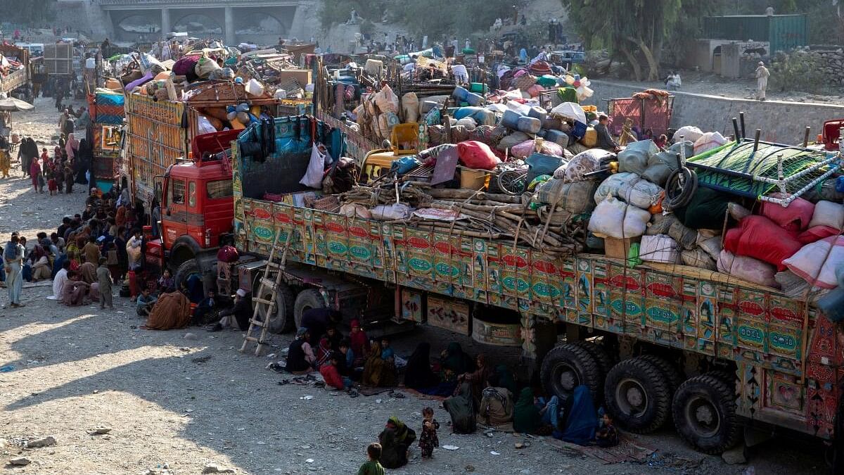 <div class="paragraphs"><p>Trucks loaded with goods are seen as Afghan nationals head back to Afghanistan, at the Torkham border crossing between Pakistan and Afghanistan.</p></div>