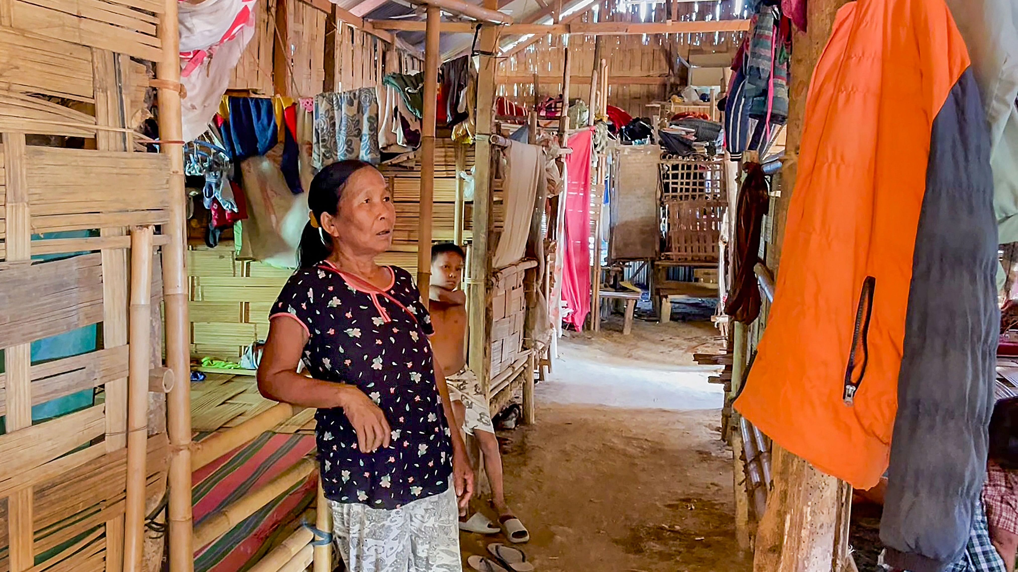 <div class="paragraphs"><p>A woman from Myanmar with her son at a relief camp at Sihhmui village, in Aizawl district, Mizoram. More than 30,000 people, mostly from Chin state in Myanmar, have been living in Mizoram after they fled following a military coup in February 2021.</p></div>