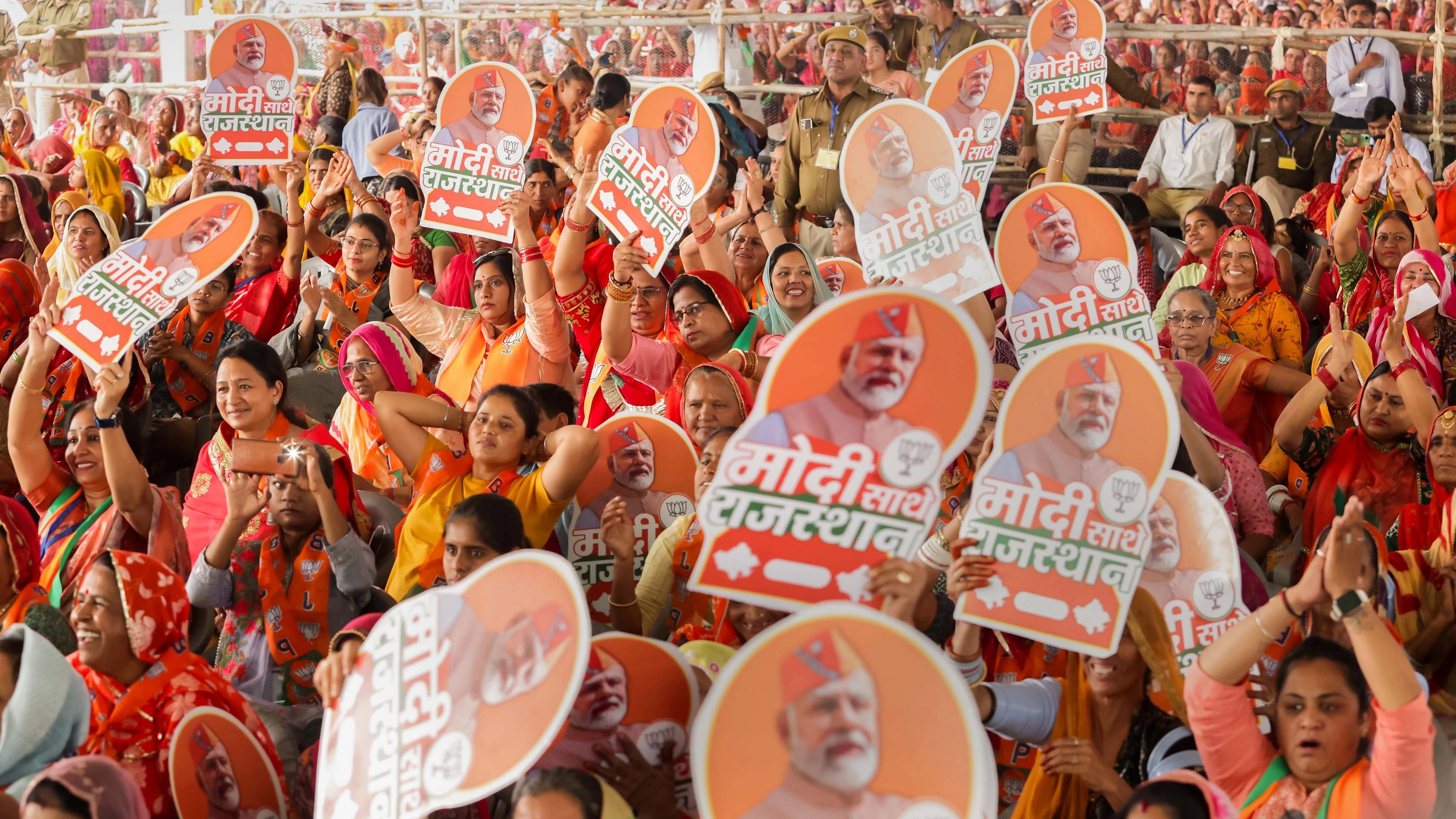 <div class="paragraphs"><p> Prime Minister Narendra Modi's supporters in one of his rallies ahead of Rajasthan Assembly elections, in Pali</p></div>