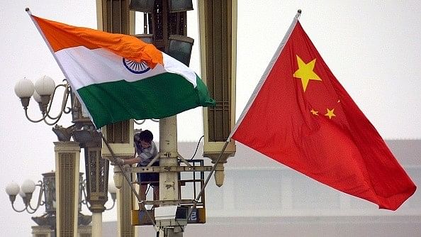 <div class="paragraphs"><p>Indian and China flags. </p></div>