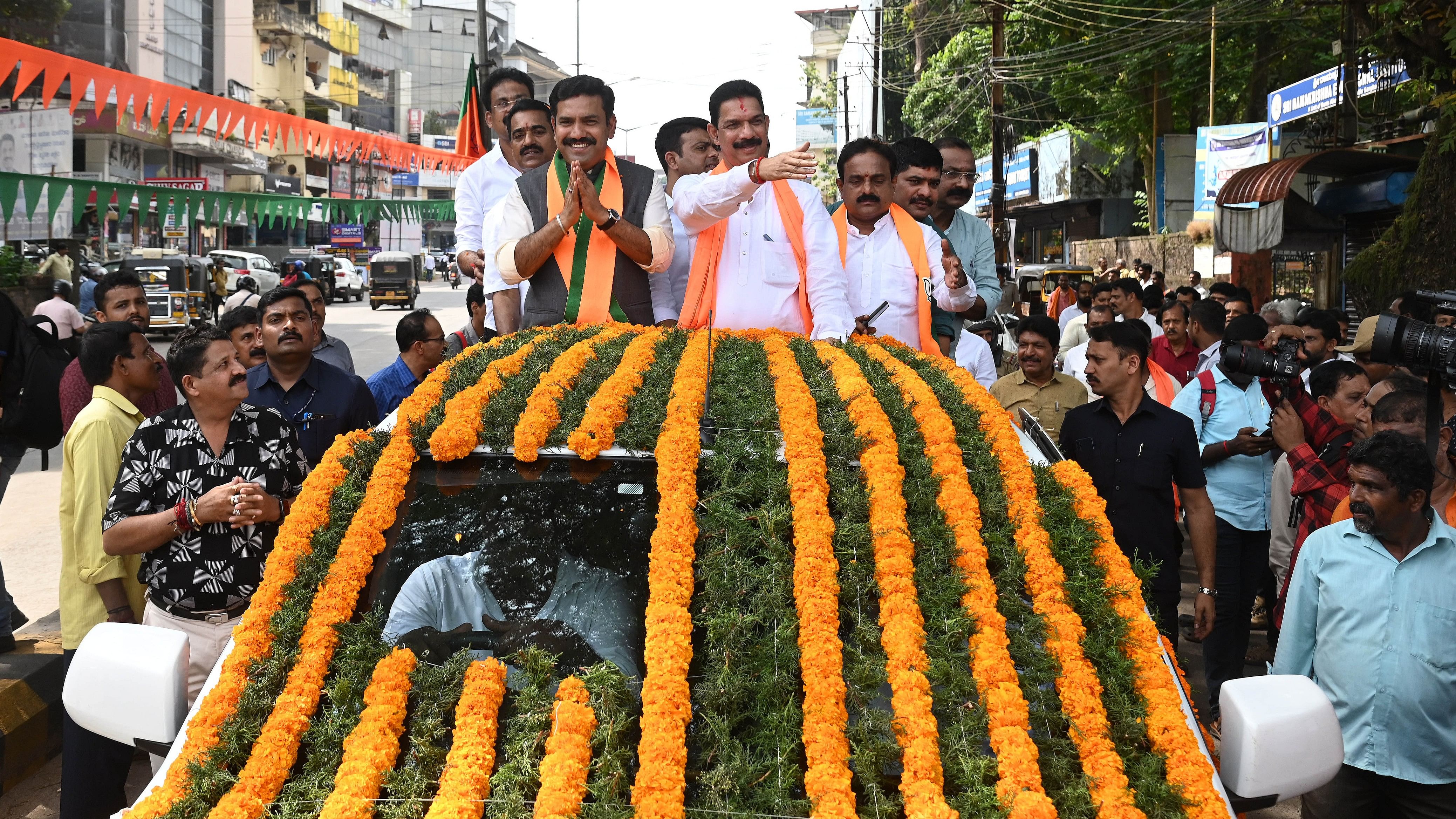 <div class="paragraphs"><p>State BJP president B Y Vijayendra was welcomed through a procession in Mangaluru on Wednesday. MP Nalin Kumar Kateel, Mangaluru City South MLA D Vedavyas Kamath, Mangaluru City</p></div>