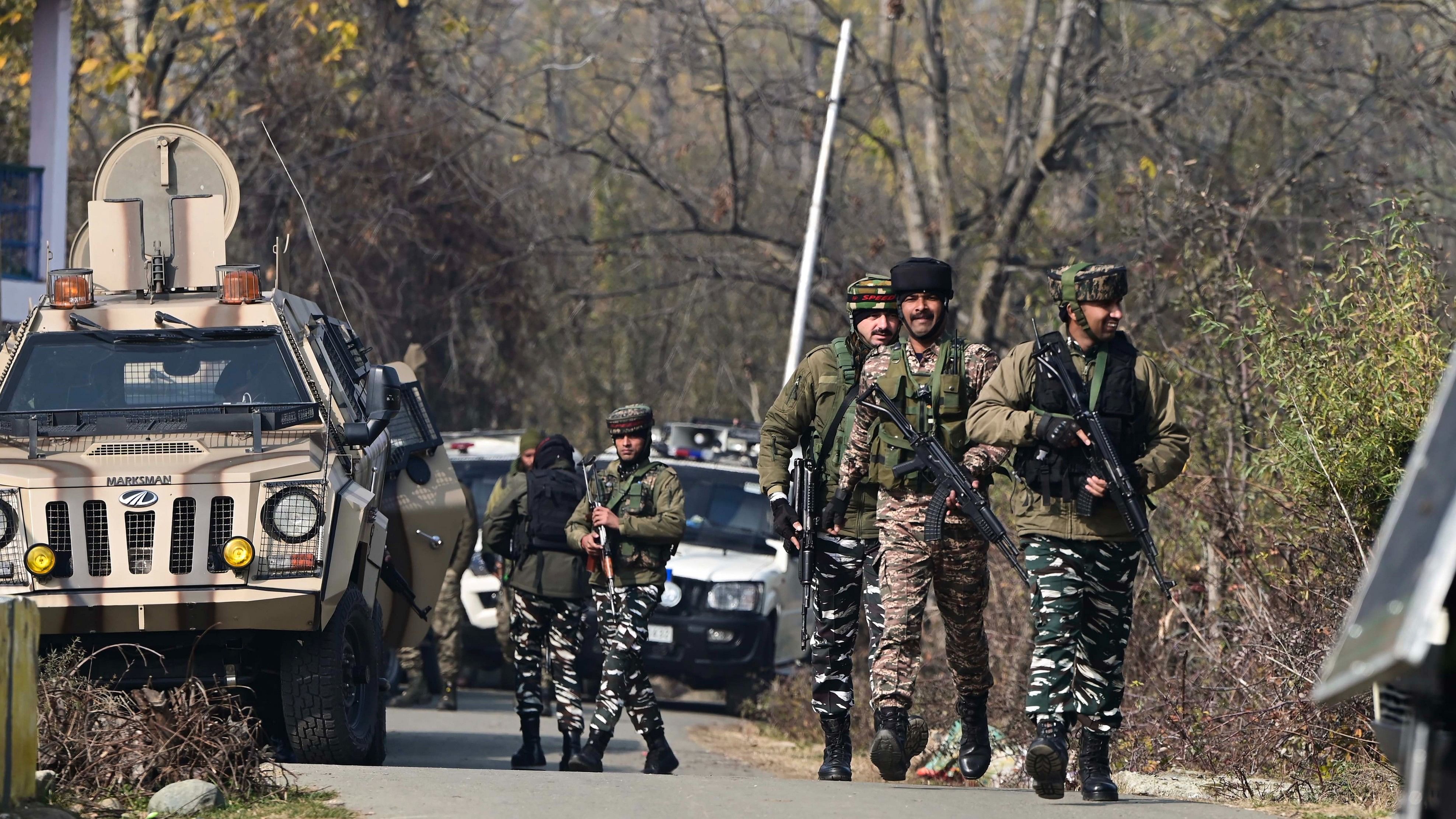 <div class="paragraphs"><p>Security personnel stand guard during an encounter in J&amp;K.&nbsp;</p></div>