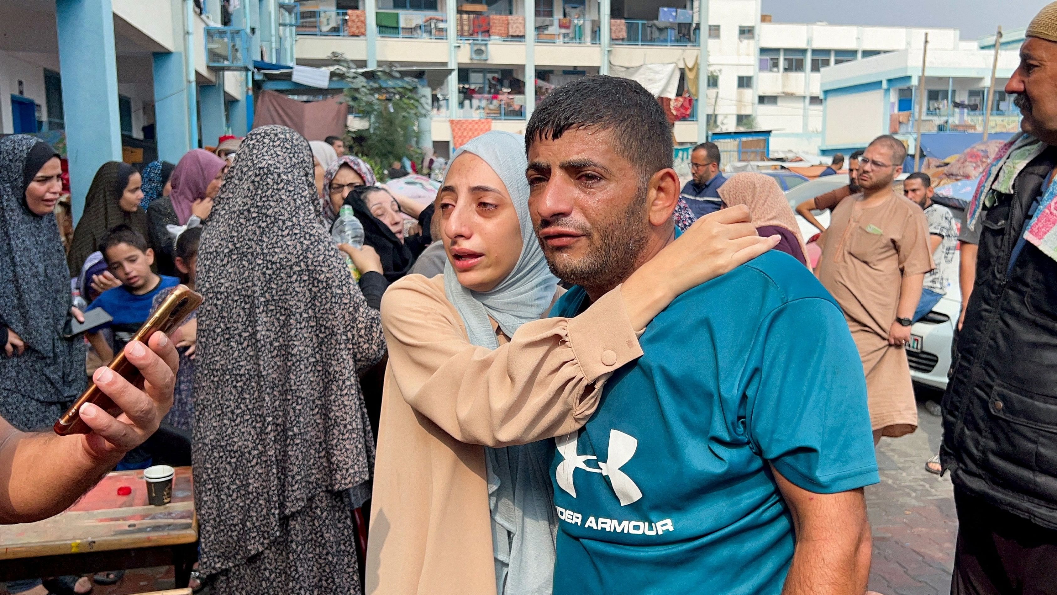 <div class="paragraphs"><p>Palestinians react at the damages at a UN-run school sheltering displaced people, following an Israeli strike, in Jabalia in the northern Gaza Strip, November 2, 2023. </p></div>