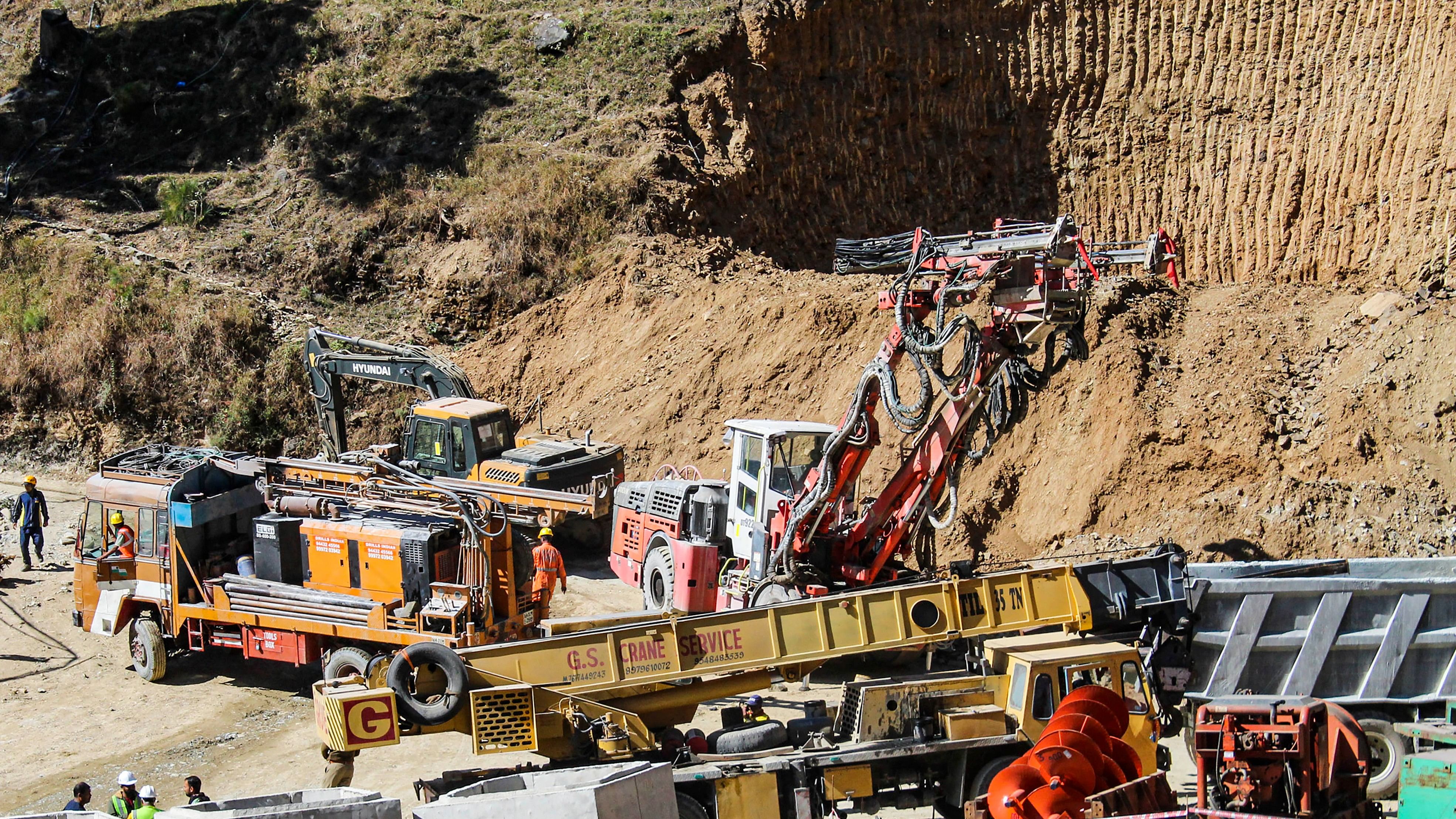 <div class="paragraphs"><p>NDRF personnel and others at the under-construction tunnel between Silkyara and Dandalgaon on the Brahmakhal-Yamunotri national highway, days after a portion of the tunnel collapsed trapping several workers inside, in Uttarkashi district.&nbsp;</p></div>