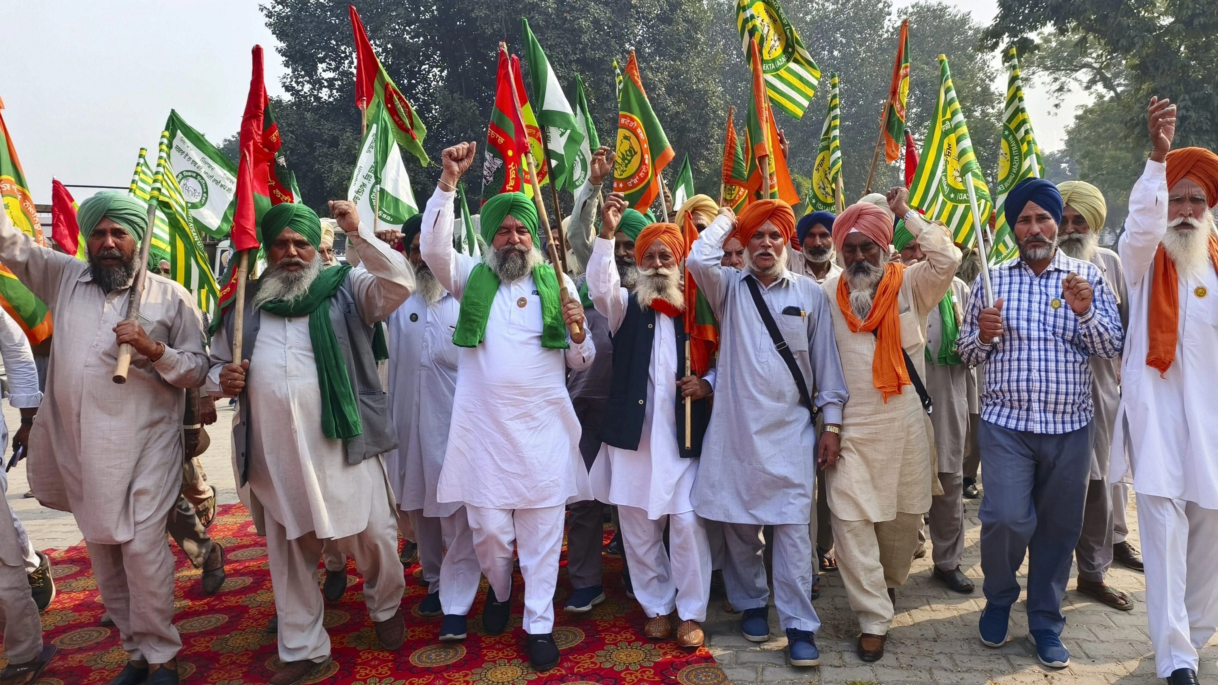 <div class="paragraphs"><p>Members of various farmer organisations raise slogans during a protest against the Punjab government against action over stubble burning issue in Patiala, Monday, Nov. 20, 2023.</p></div>