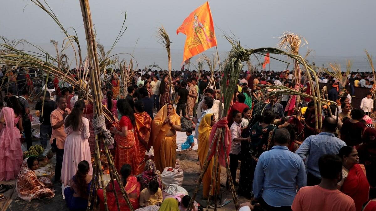 <div class="paragraphs"><p>Hindu devotees worship the Sun god during Chhath Puja in Mumbai, India, November 19, 2023.</p></div>