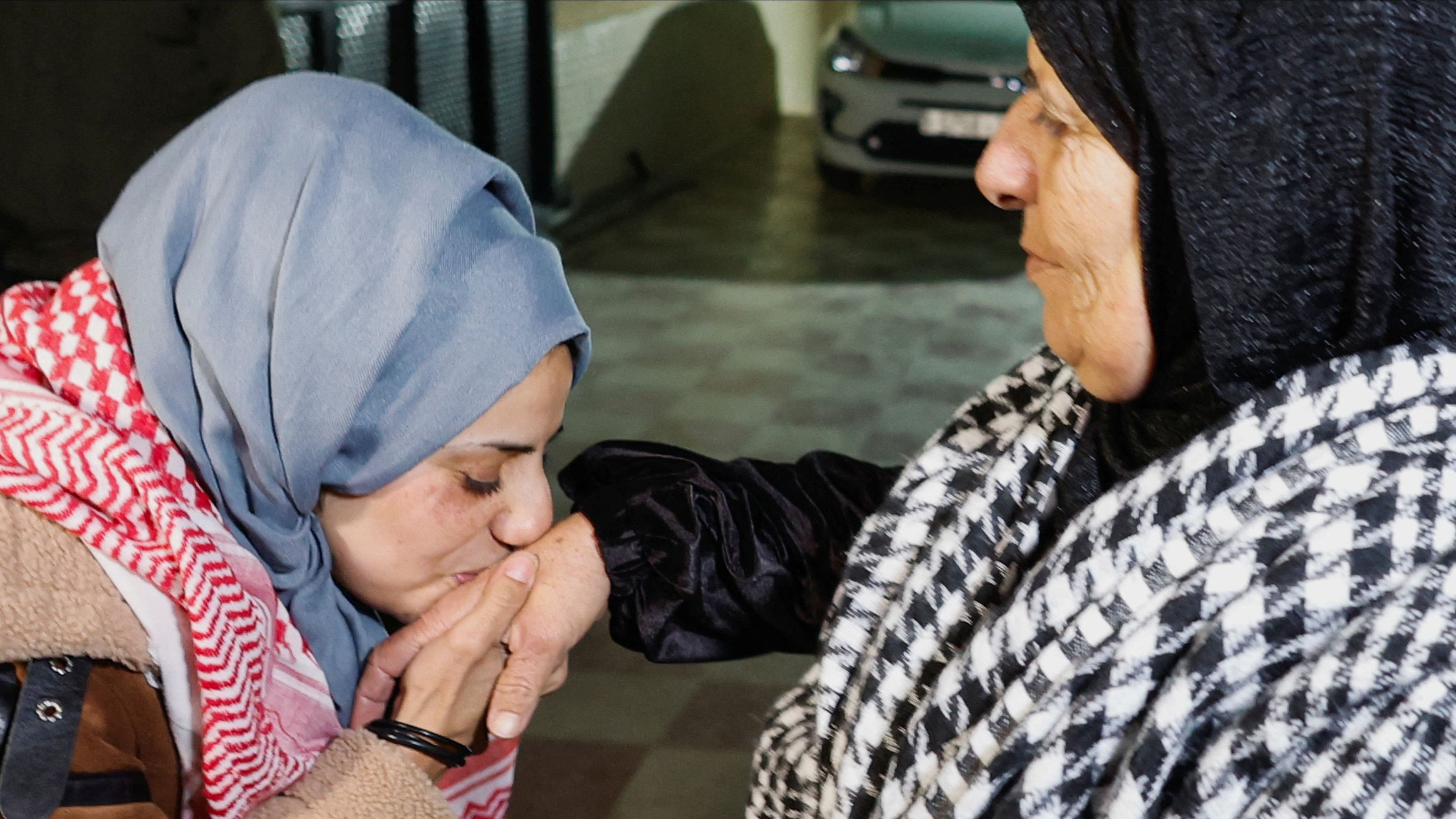 <div class="paragraphs"><p>Released Palestinian prisoner Lamees Abu Arkoob kisses her mother outside her house near Hebron in the Israeli-occupied West Bank, amid a hostages-prisoners swap deal between Hamas and Israel, November 29, 2023.</p></div>