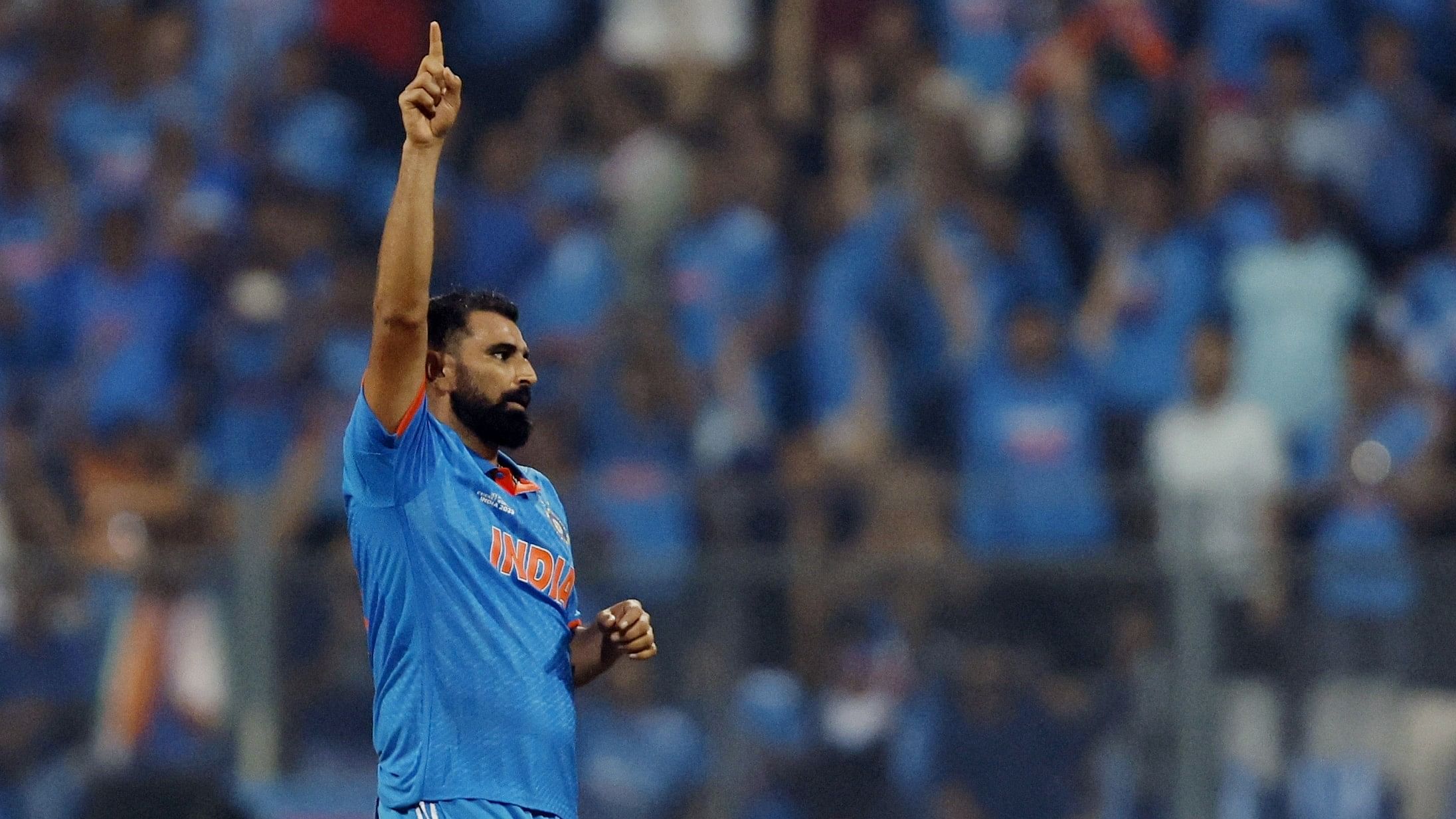 <div class="paragraphs"><p>Mohammed Shami celebrates after taking the wicket of New Zealand's Lockie Ferguson, caught out by K L Rahul to win the match and advance to the finals.&nbsp;</p></div>