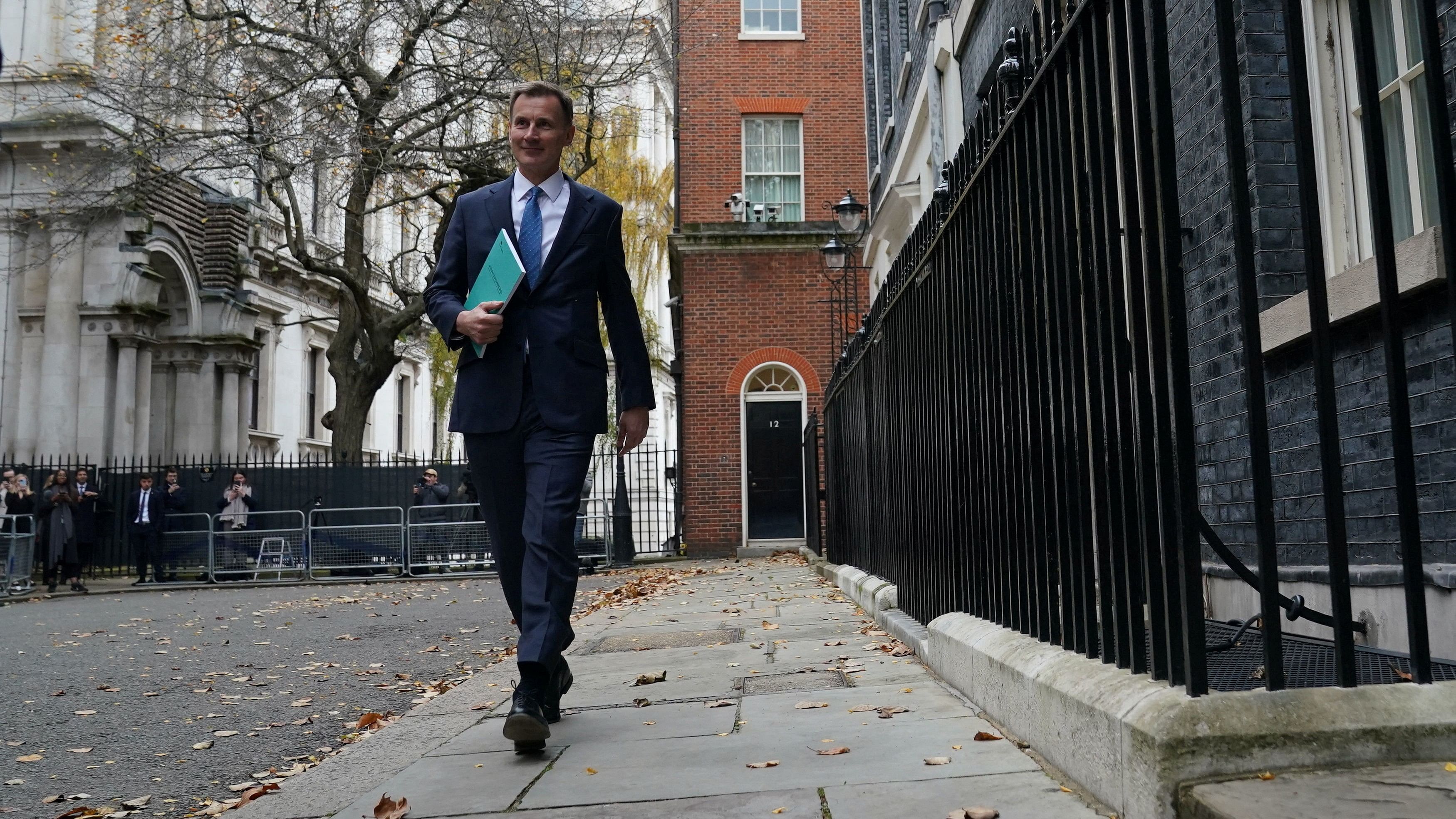 <div class="paragraphs"><p>Chancellor of the Exchequer Jeremy Hunt leaves 11 Downing Street for the House of Commons to deliver his autumn statement, in London, Britain, November 22, 2023.</p></div>