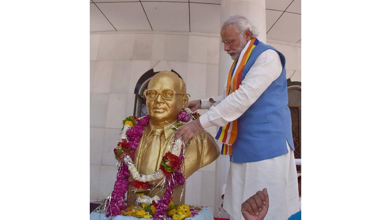 <div class="paragraphs"><p>PM Modi garlands the bust of Dr B R Ambedkar at the Bhim Birthplace Memorial in Madhya Pradesh. </p></div>