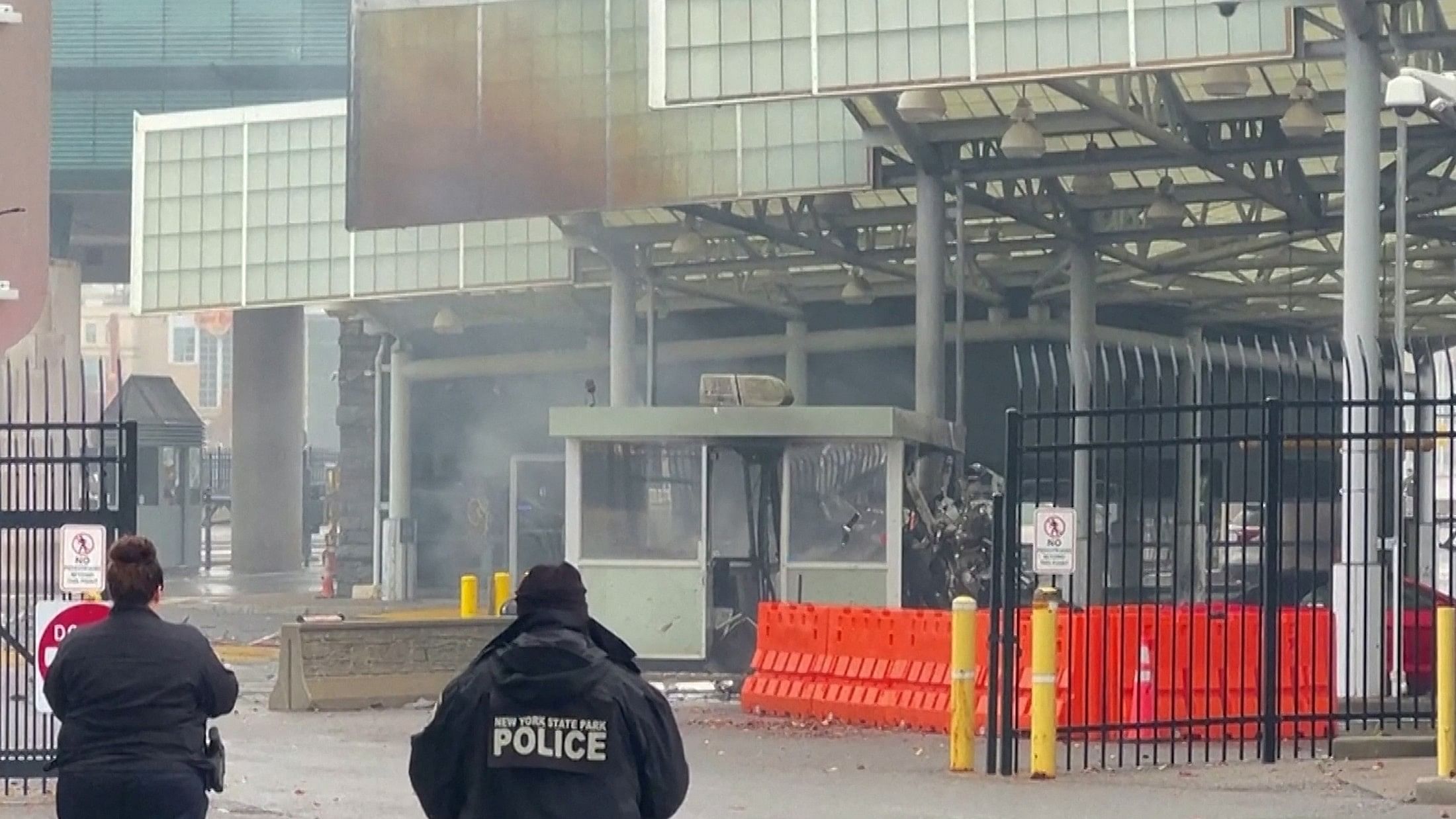 <div class="paragraphs"><p>Police officers view the scene after an incident at the Rainbow Bridge US border crossing with Canada, in Niagara Falls, New York, U.S. November 22, 2023 in a still image from video.  </p></div>