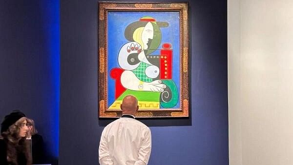 <div class="paragraphs"><p>Pablo Picasso's 1932 painting "Femme a la Montre" is displayed at an auction at Sotheby's, in New York City, U.S., November 8,</p></div>