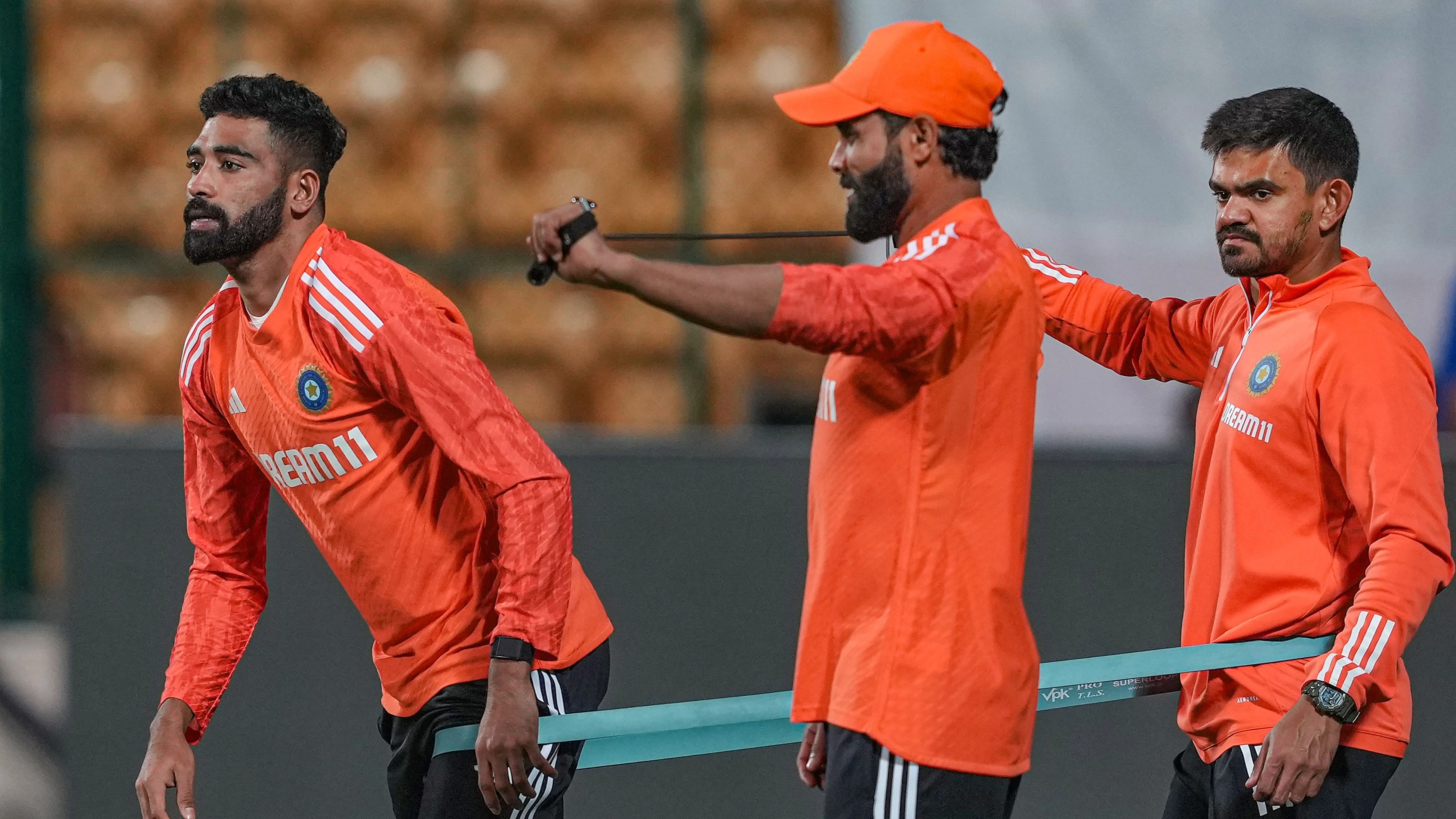 <div class="paragraphs"><p>Mohammed Siraj and Ravindra Jadeja during a practice session ahead of the ICC Men's Cricket World Cup 2023 match against Netherlands, at Chinnaswamy Stadium in Bengaluru.</p></div>