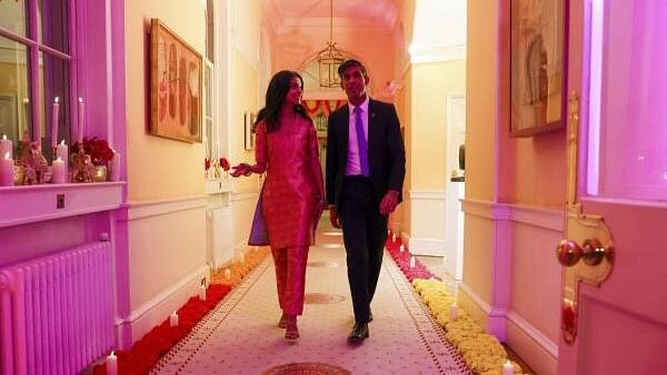 <div class="paragraphs"><p>UK Prime Minister Rishi Sunak with wife Akshata Murty during a reception at 10, Downing Street to celebrate Diwali, in London.</p></div>