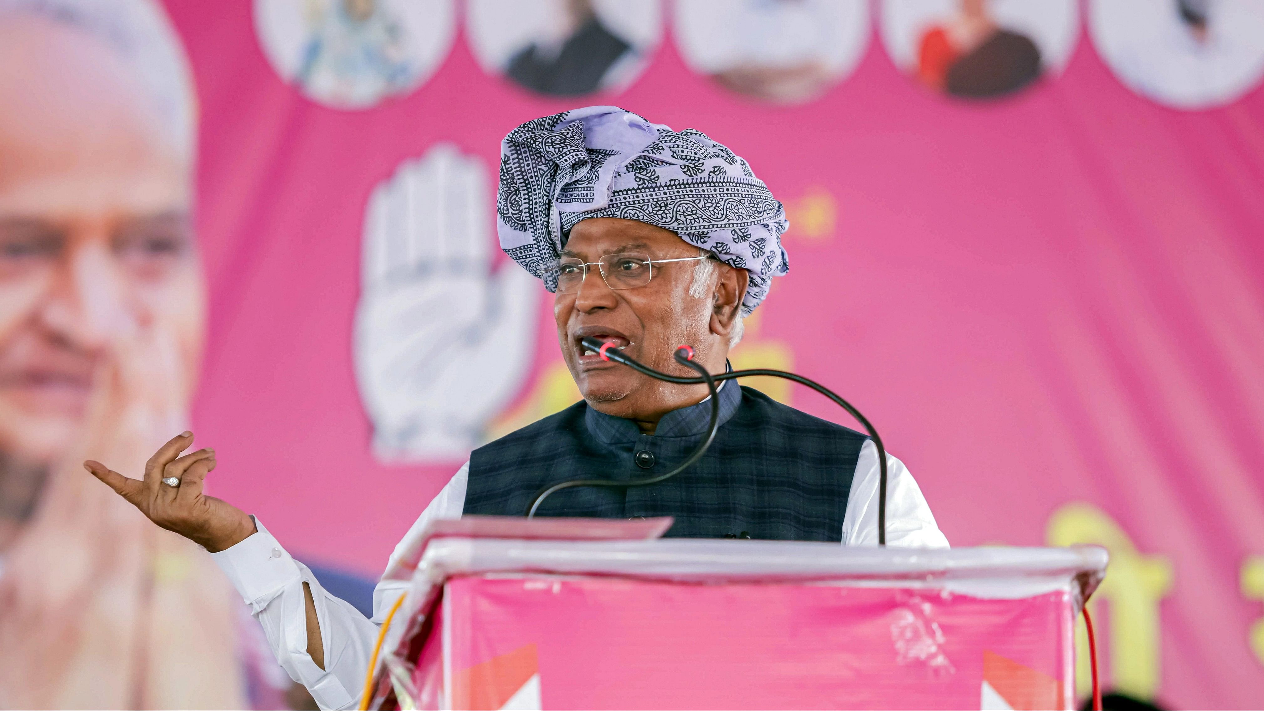 <div class="paragraphs"><p>Congress President Mallikarjun Kharge speaks during a public meeting ahead of Rajasthan Assembly elections, at Mavli in Udaipur district, Tuesday, Nov. 21, 2023. </p></div>