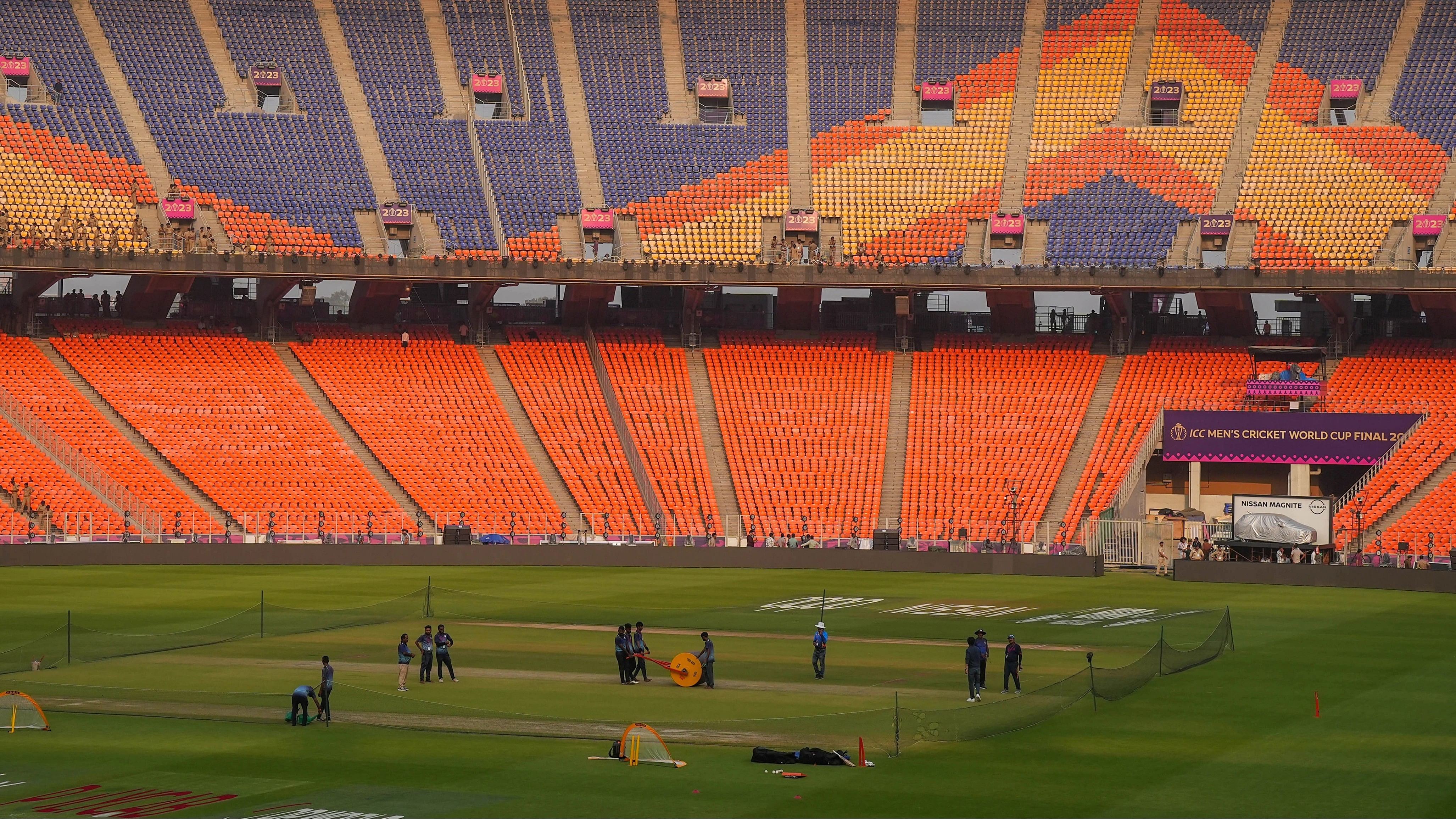 <div class="paragraphs"><p>Groundsmen prepare the pitch ahead of the ICC Men's Cricket World Cup 2023 final between India and Australia, at the Narendra Modi Stadium in Ahmedabad, Friday.</p></div>