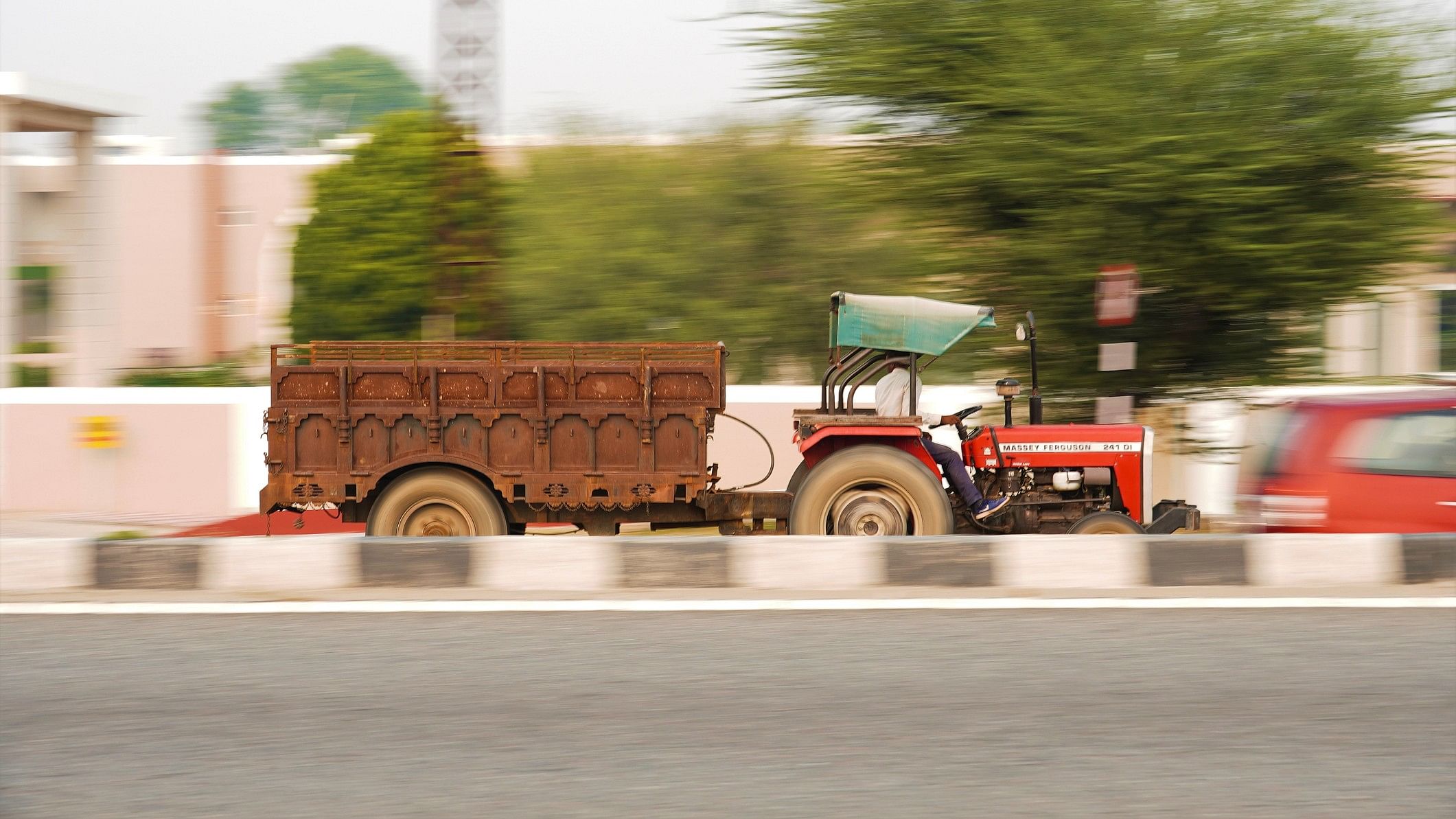 <div class="paragraphs"><p>Representative image of a tractor-trolley.</p></div>