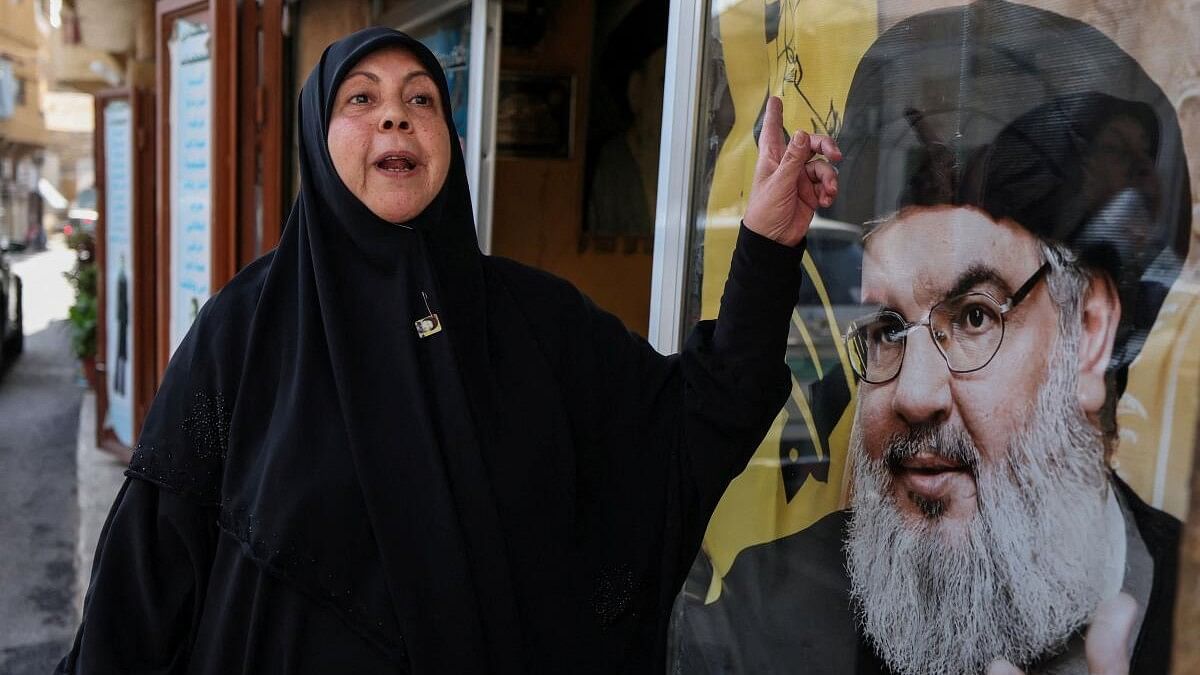 <div class="paragraphs"><p>Asaleswoman says "We have confidence in the resistance and they trust Lebanon's Hezbollah leader Sayyed Hassan Nasrallah"</p></div>