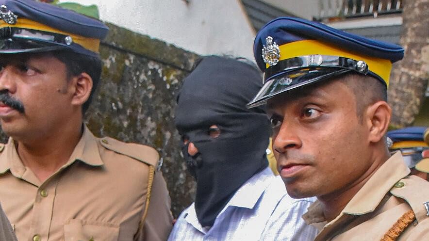 <div class="paragraphs"><p>Dominic Martin, suspected convict in Kalamassery blast case, following his arrest, in Kochi.</p></div>