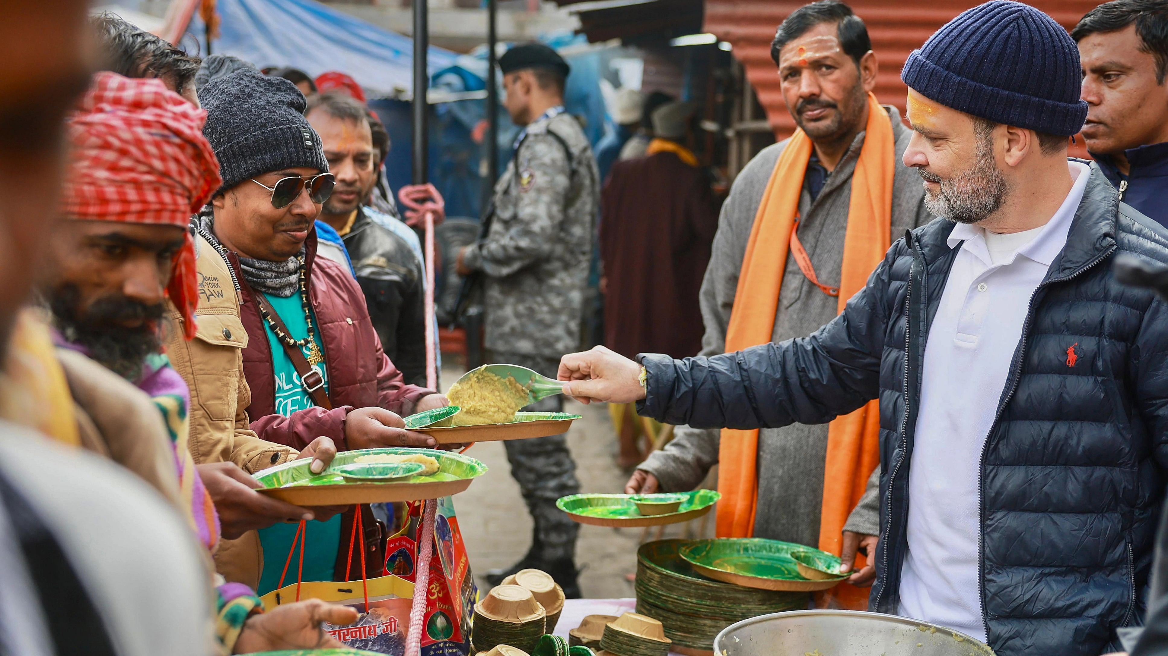 <div class="paragraphs"><p>Congress leader Rahul Gandhi distributes 'prasad' to devotees during a visit to Kedarnath Dham, in Rudraprayag district, Monday, Nov. 6, 2023. </p></div>