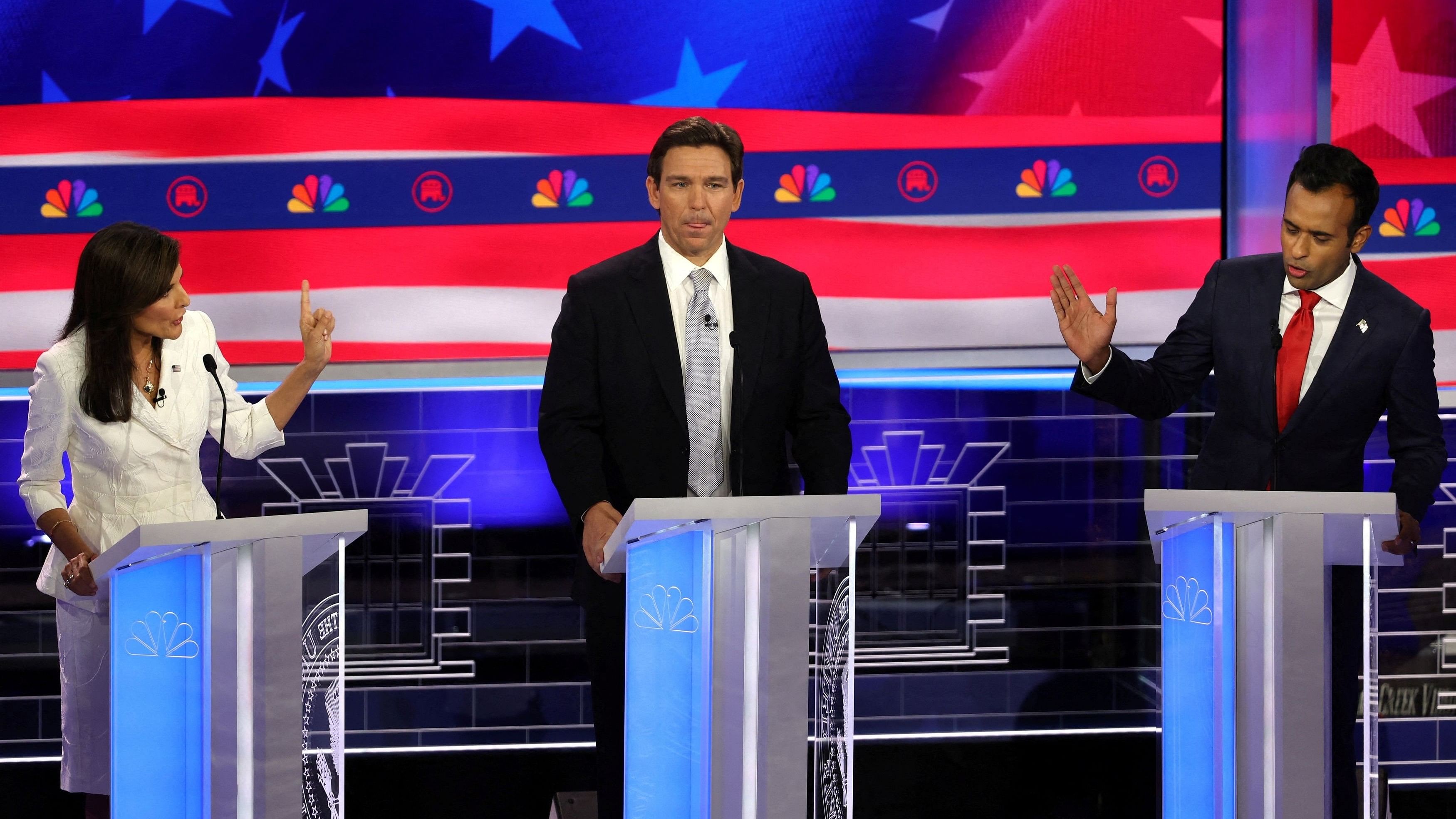 <div class="paragraphs"><p>Florida Governor Ron DeSantis licks his lips back and forth as former South Carolina Governor Nikki Haley and former biotech executive Vivek Ramaswamy argue on either side of him at the third Republican candidates' US presidential debate of the 2024 US presidential campaign hosted by <em><em>NBC News</em></em> at the Adrienne Arsht Center for the Performing Arts in Miami, Florida, U.S., November 8, 2023. </p></div>