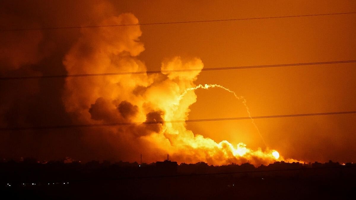 <div class="paragraphs"><p>Smoke and flames rise during Israeli strikes in the Gaza Strip, as seen from the Israeli side of the border with Gaza, in southern Israel.</p></div>