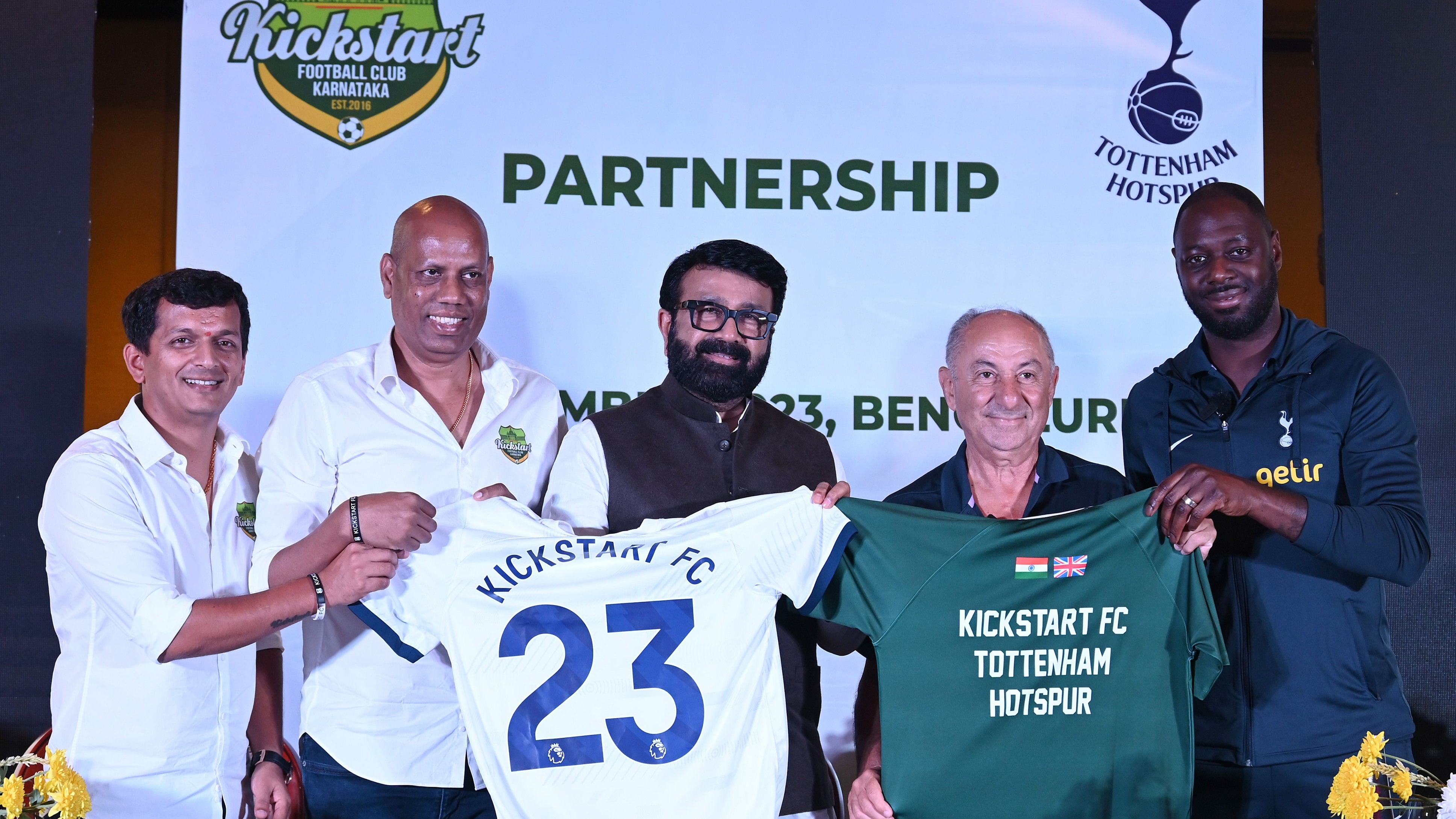 <div class="paragraphs"><p>(From left to right) Founder and CEO of Kickstart FC Laxman Bhattarai, Founder and Chairman of Kickstart FC Shekar Rajan, AIFF Vice President and MLA NA Haris, Osvaldo Ardiles and Ledley King exchange jerseys as Kickstart FC inks a partnership deal with Tottenham Hotspur in Bengaluru.</p></div>