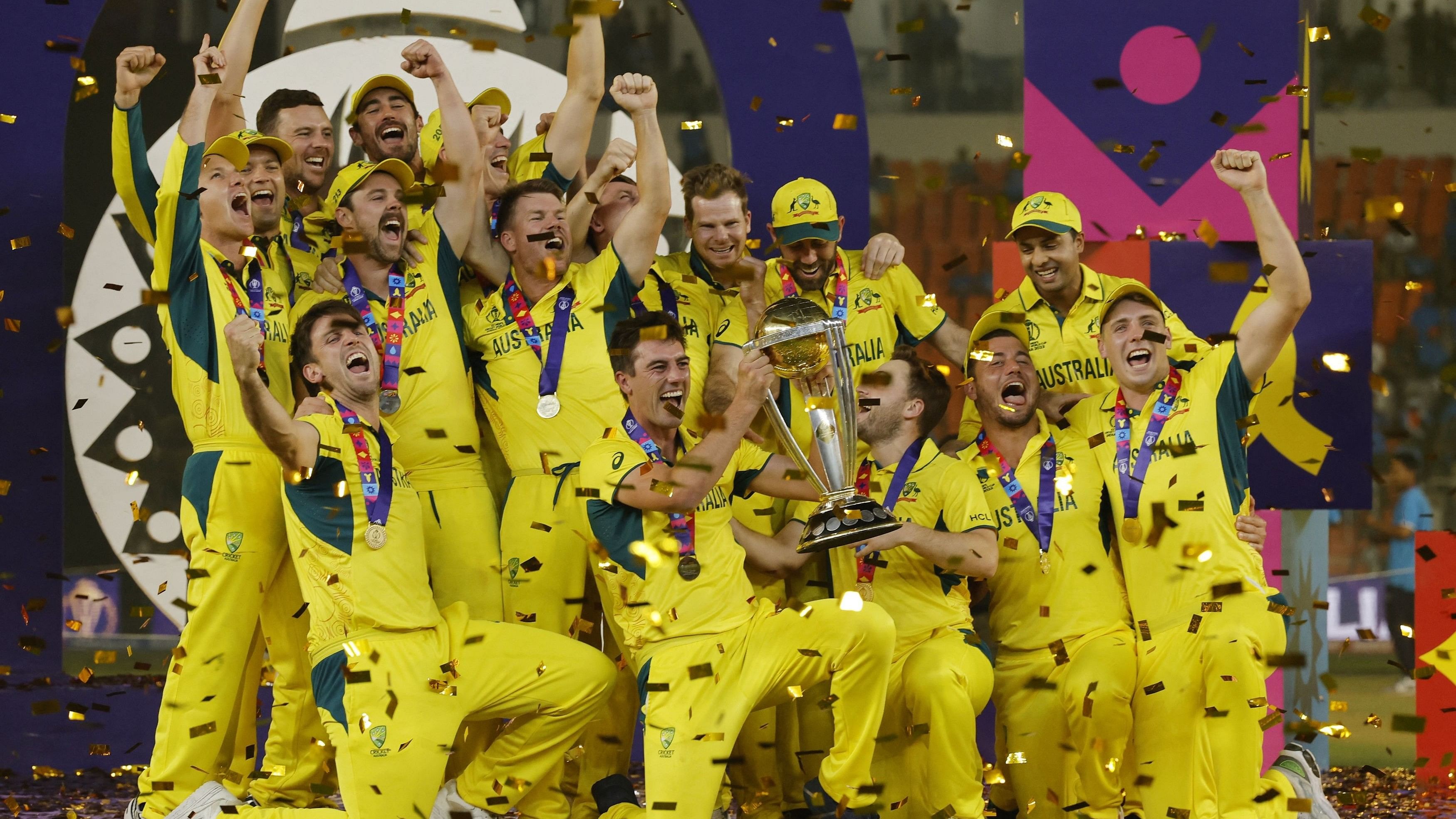 <div class="paragraphs"><p> Australia's Pat Cummins celebrates with the trophy and teammates after winning the ICC Cricket World Cup.</p></div>